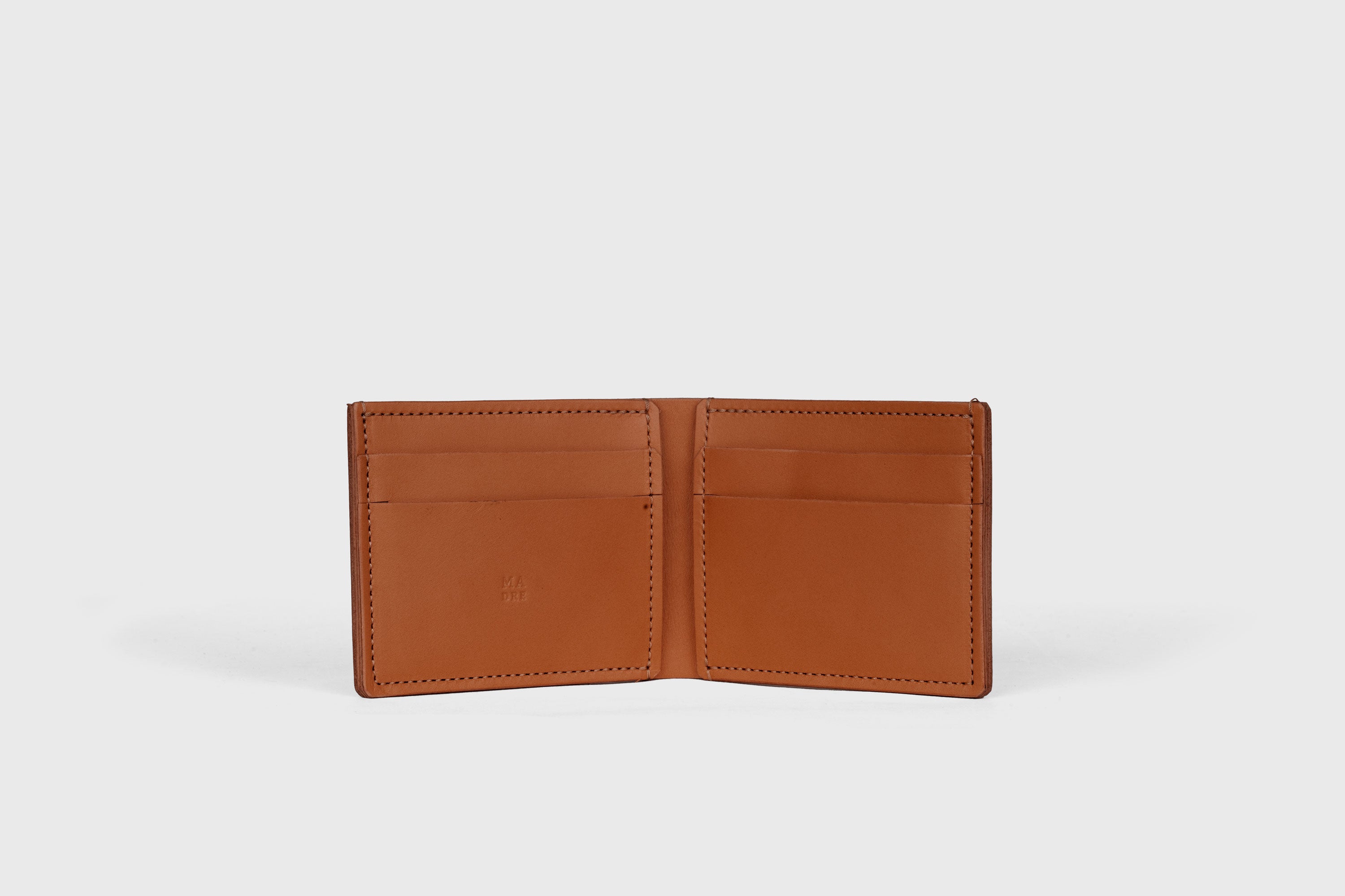Bifold Wallet Horizontal With 6 Card Slots In Dark Brown Color In Vegetable Tanned Leather Minimalistic Design Atelier Madre Manuel Dreesmann Barcelona Spain