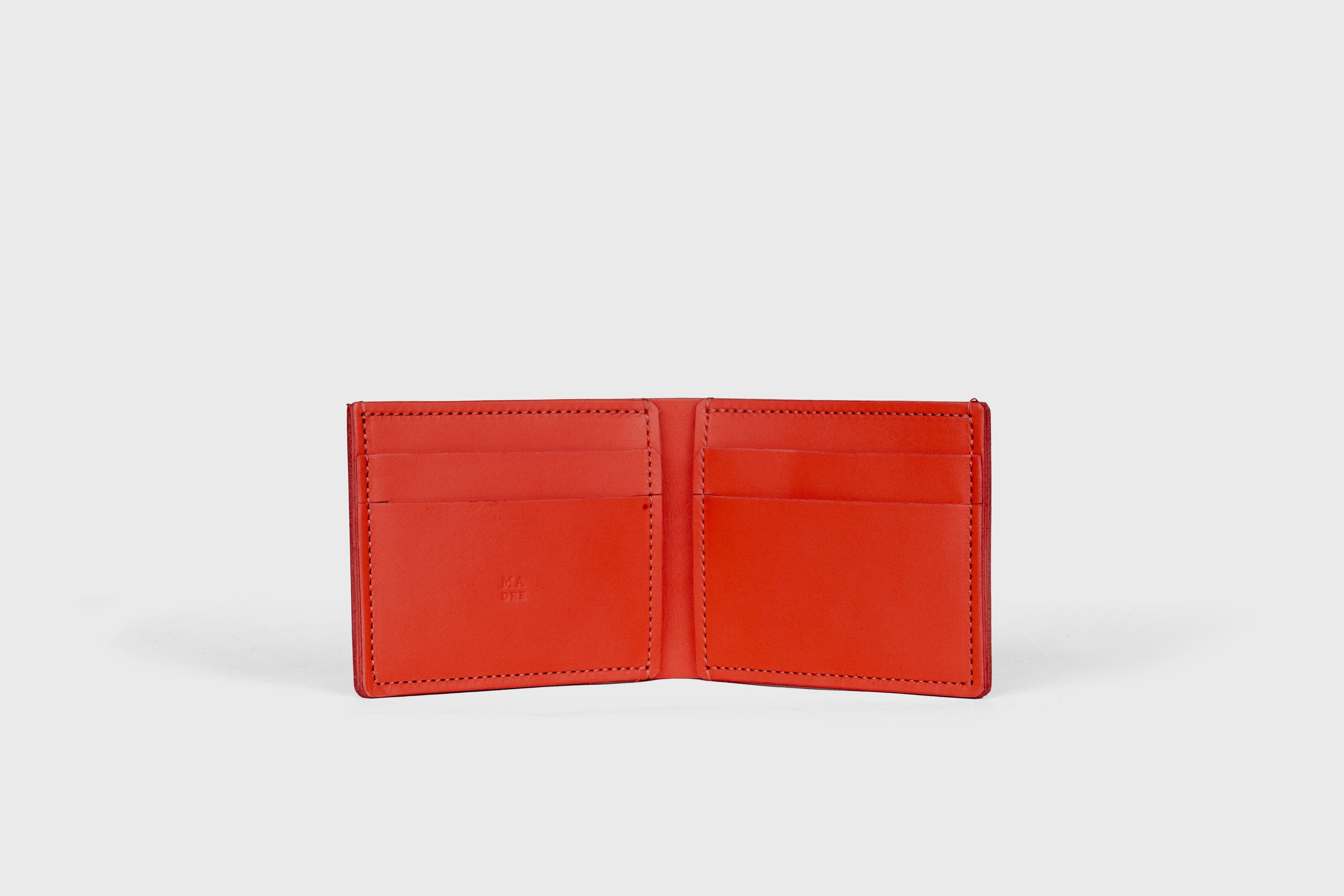 Bifold Wallet Horizontal With 6 Card Slots In Red Color In Vegetable Tanned Leather Minimalistic Design Atelier Madre Manuel Dreesmann Barcelona Spain