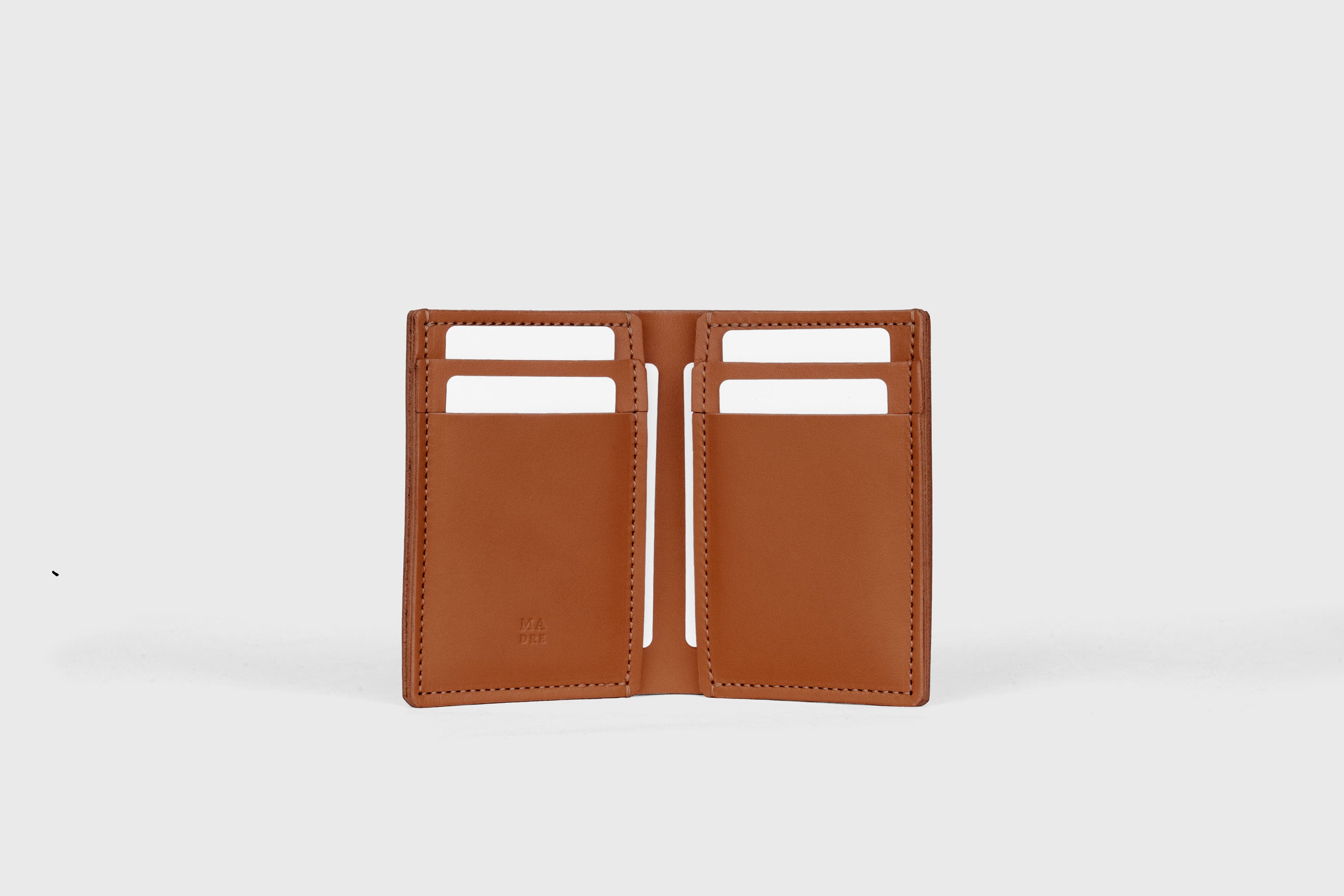 Bifold Wallet Vertical 6 Slots In Dark Brown Color In Vegetable Tanned Leather Minimalistic Design Atelier Madre Manuel Dreesmann Barcelona Spain