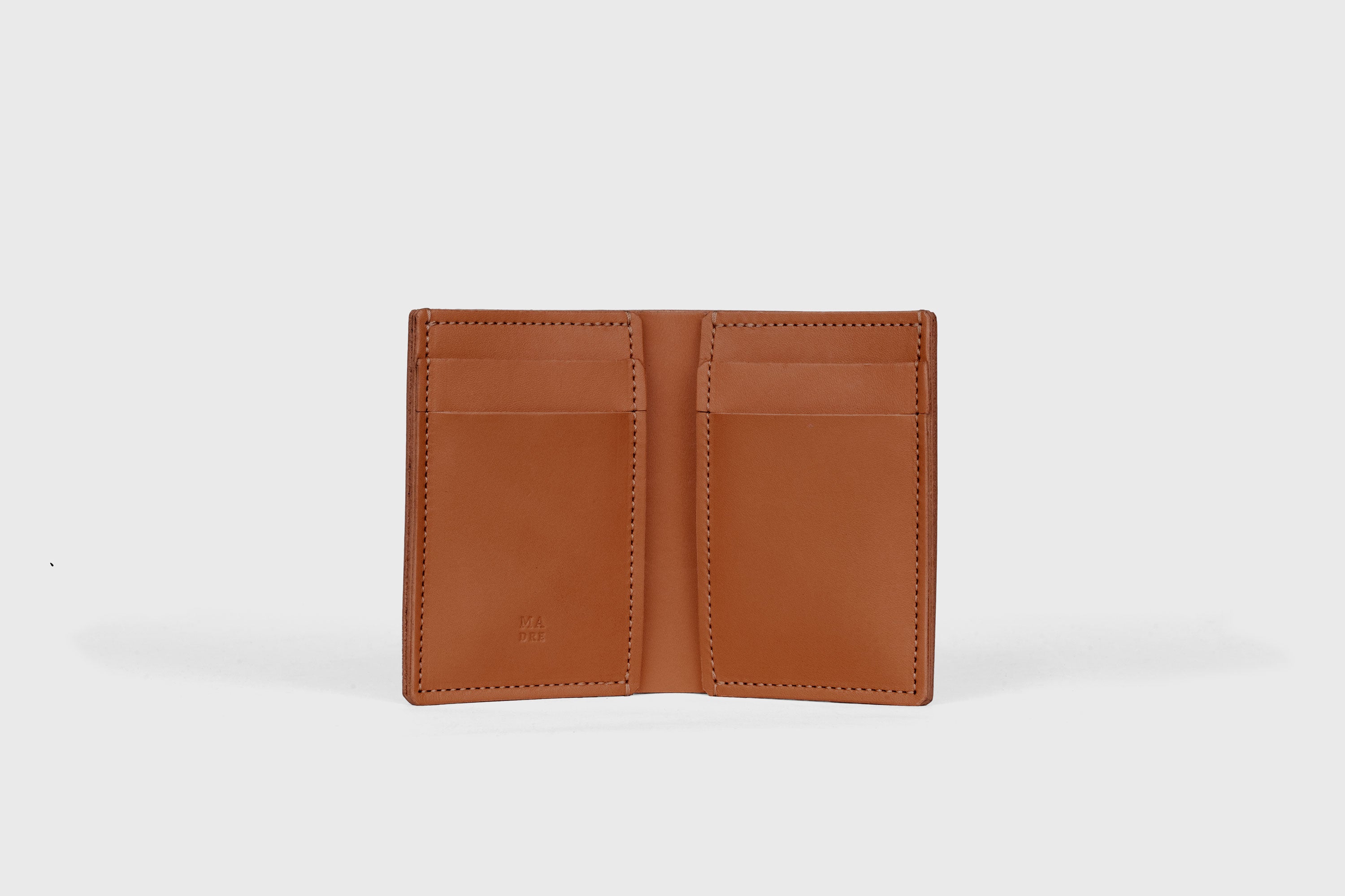 Bifold Wallet Vertical 6 Slots In Dark Brown Color In Vegetable Tanned Leather Minimalistic Design Atelier Madre Manuel Dreesmann Barcelona Spain