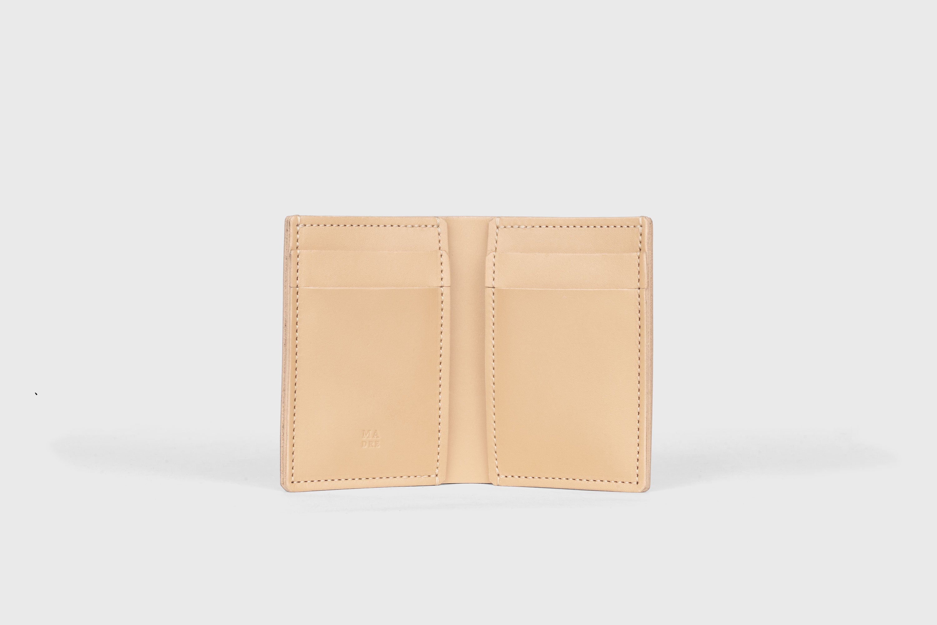 Bifold Wallet Vertical 6 Slots In Natural Color In Vegetable Tanned Leather Minimalistic Design Atelier Madre Manuel Dreesmann Barcelona Spain