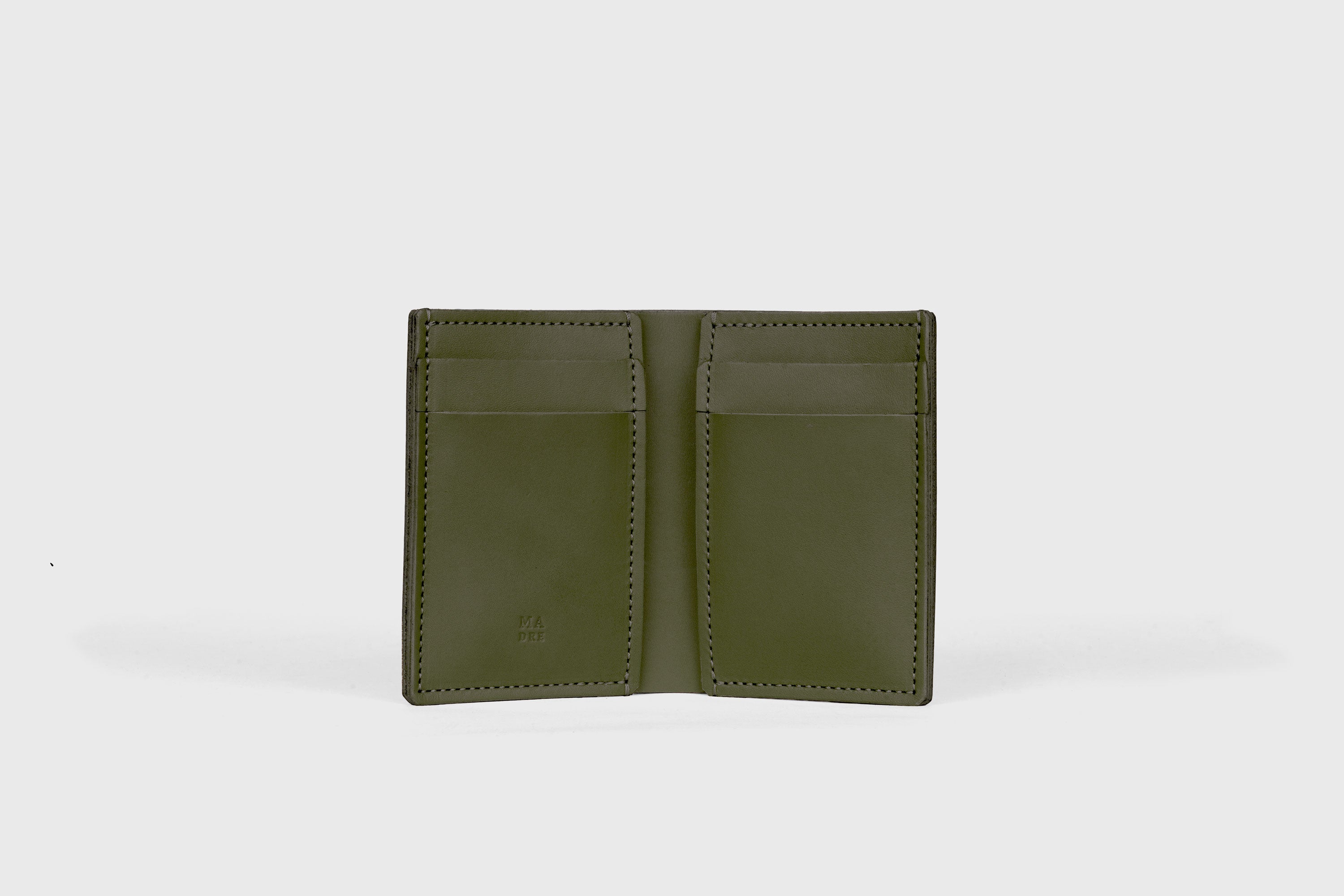 Bifold Wallet Vertical 6 Slots In Olive Green Color In Vegetable Tanned Leather Minimalistic Design Atelier Madre Manuel Dreesmann Barcelona Spain