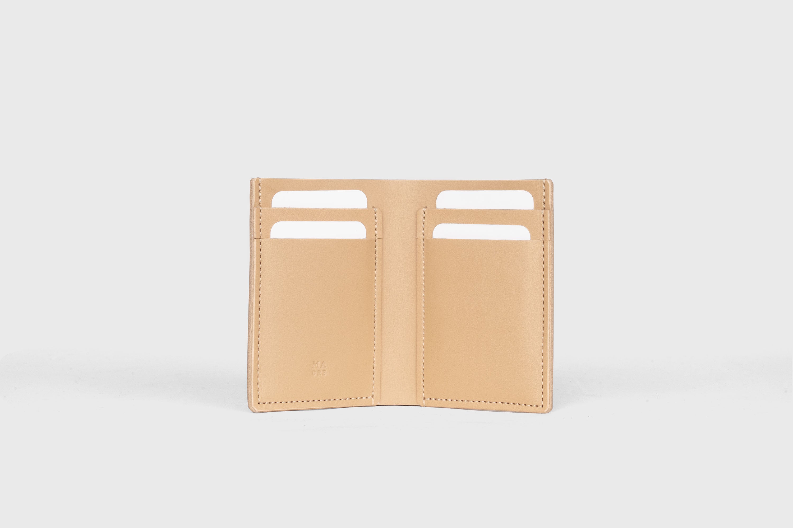 Bifold Wallet Vertical In Natural Color In Vegetable Tanned Leather Minimalistic Slim Design Atelier Madre Manuel Dreesmann Barcelona Spain