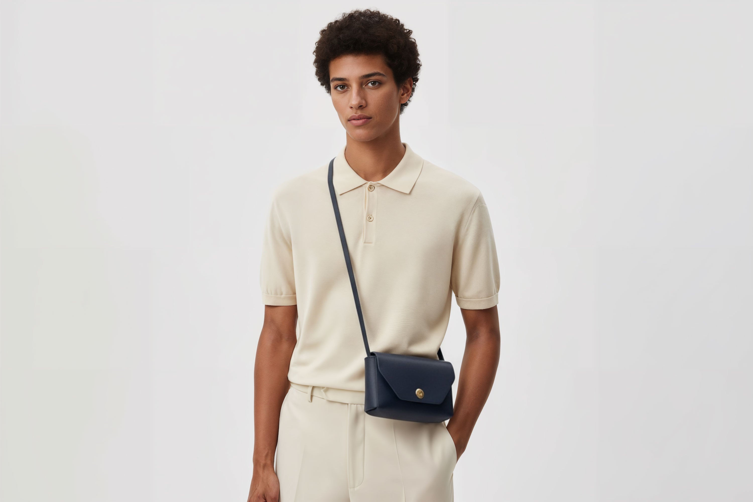 Brick Bag  Marine Blue Color Leather On Man Model Bright Background Vegetable Tanned Leather Modern Minimalist Design Premium Quality Atelier Madre Manuel Dreesmann Barcelona Spain