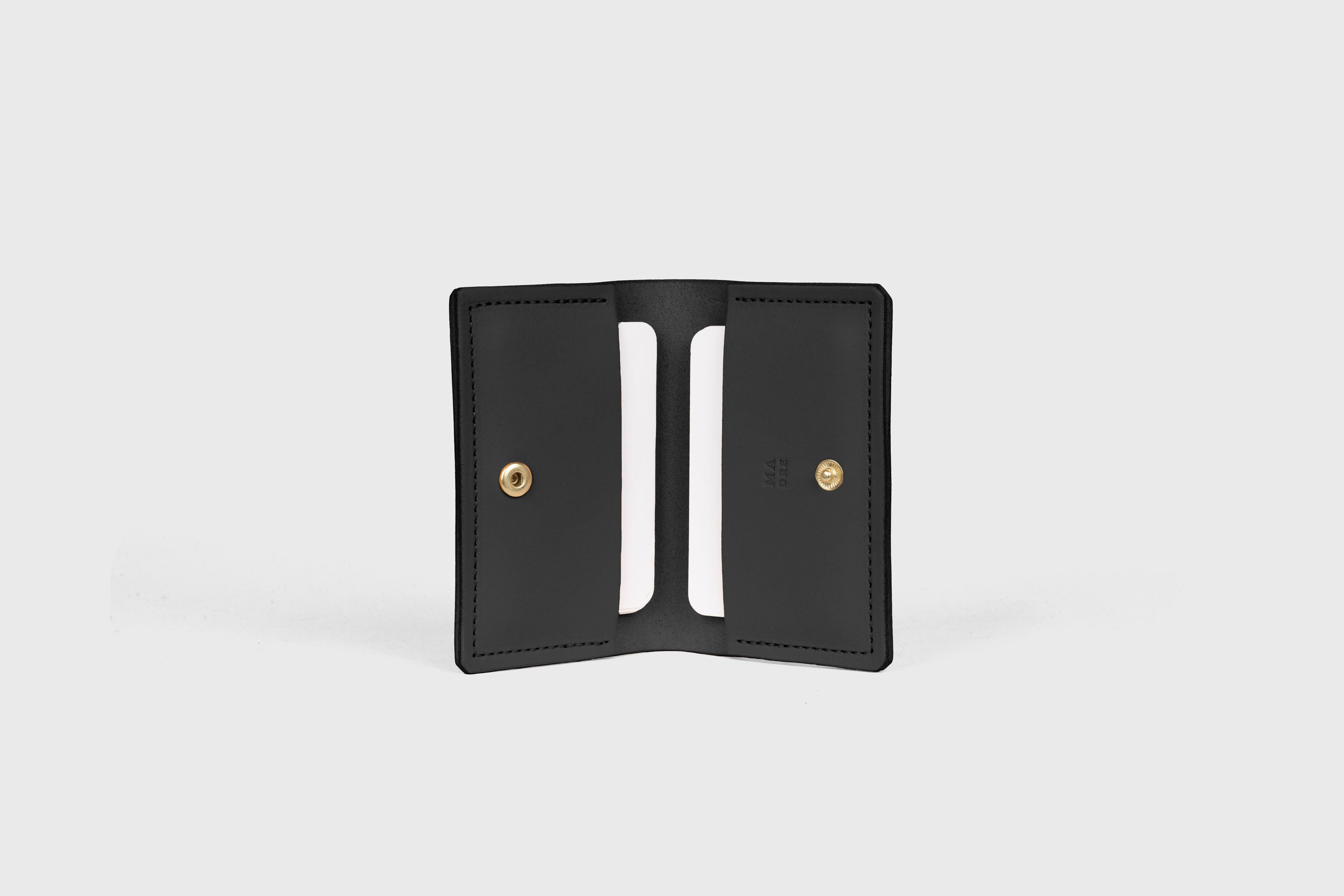 Card Etui In Black Color In Vegetable Tanned Leather Minimalistic Design With Snap Buttons Atelier Madre Manuel Dreesmann Barcelona Spain
