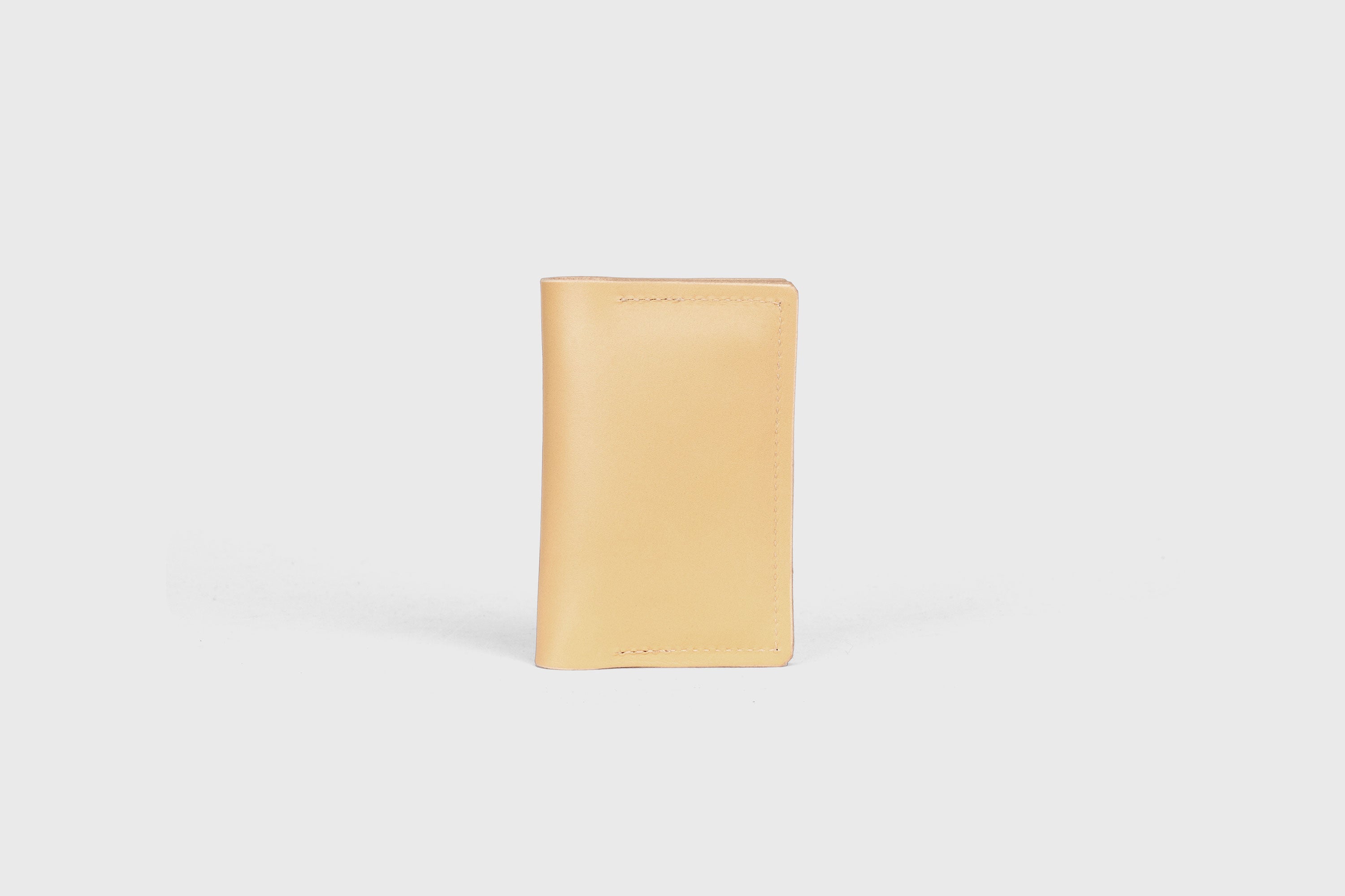 Card Etui In Natural Color In Vegetable Tanned Leather Minimalistic Design With Snap Buttons Atelier Madre Manuel Dreesmann Barcelona Spain