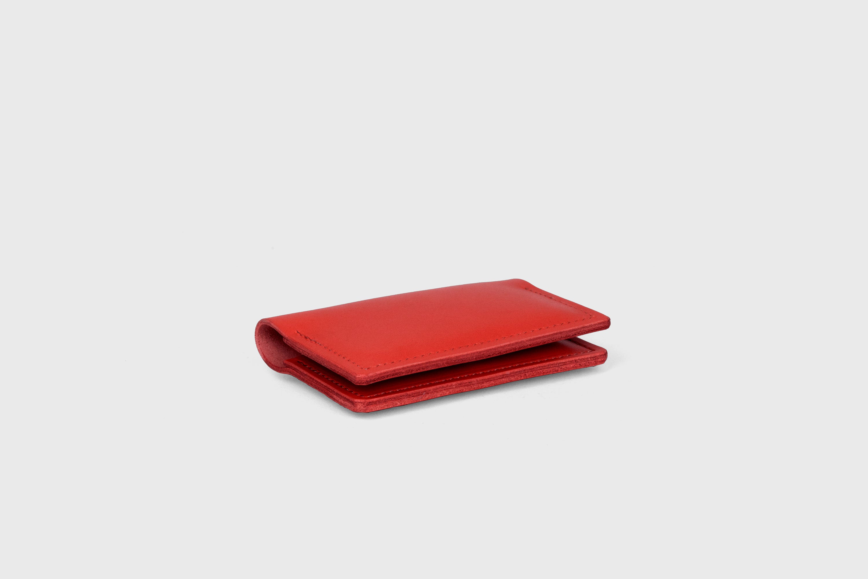 Card Etui In Red Color In Vegetable Tanned Leather Minimalistic Design With Snap Buttons Atelier Madre Manuel Dreesmann Barcelona Spain