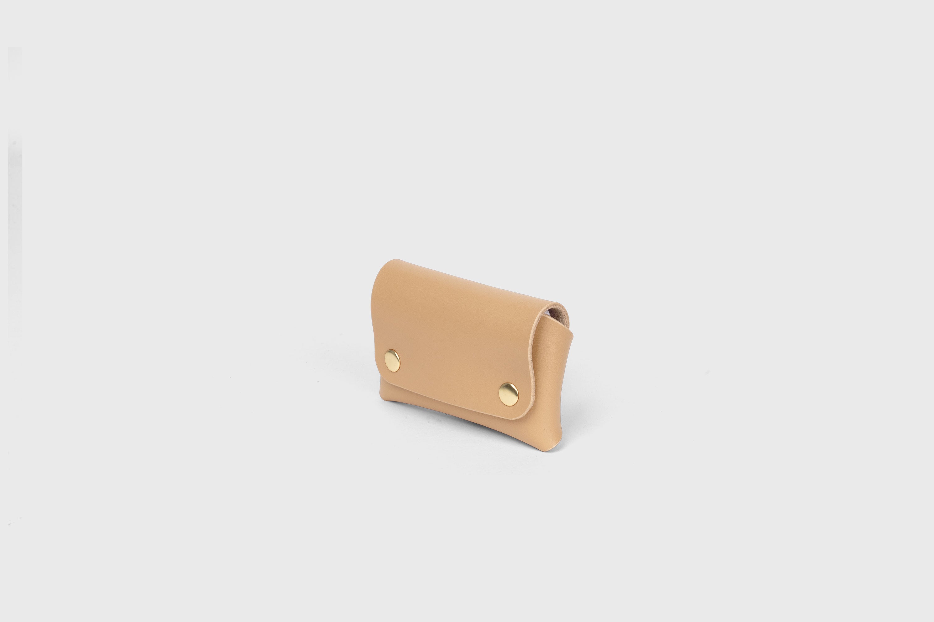 Card Holder With Snap Buttons In Natural Color Leather Minimalistic Design Leather Atelier Madre Manuel Dreesmann