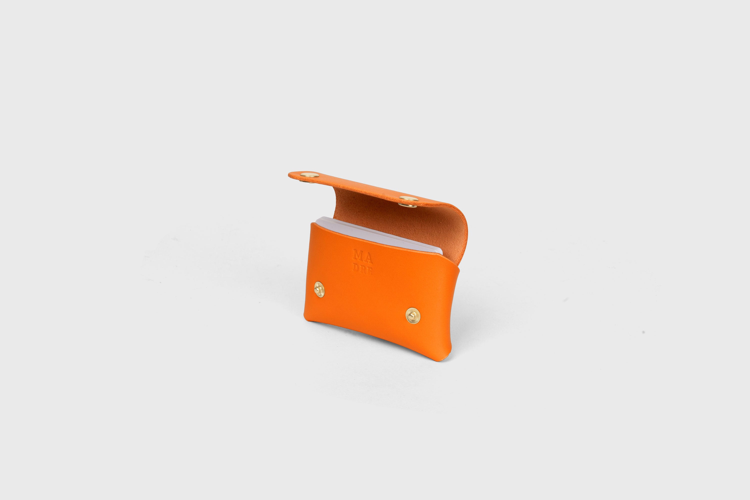 Card Holder With Snap Buttons In Orange Leather Minimalistic Design Leather Atelier Madre Manuel Dreesmann