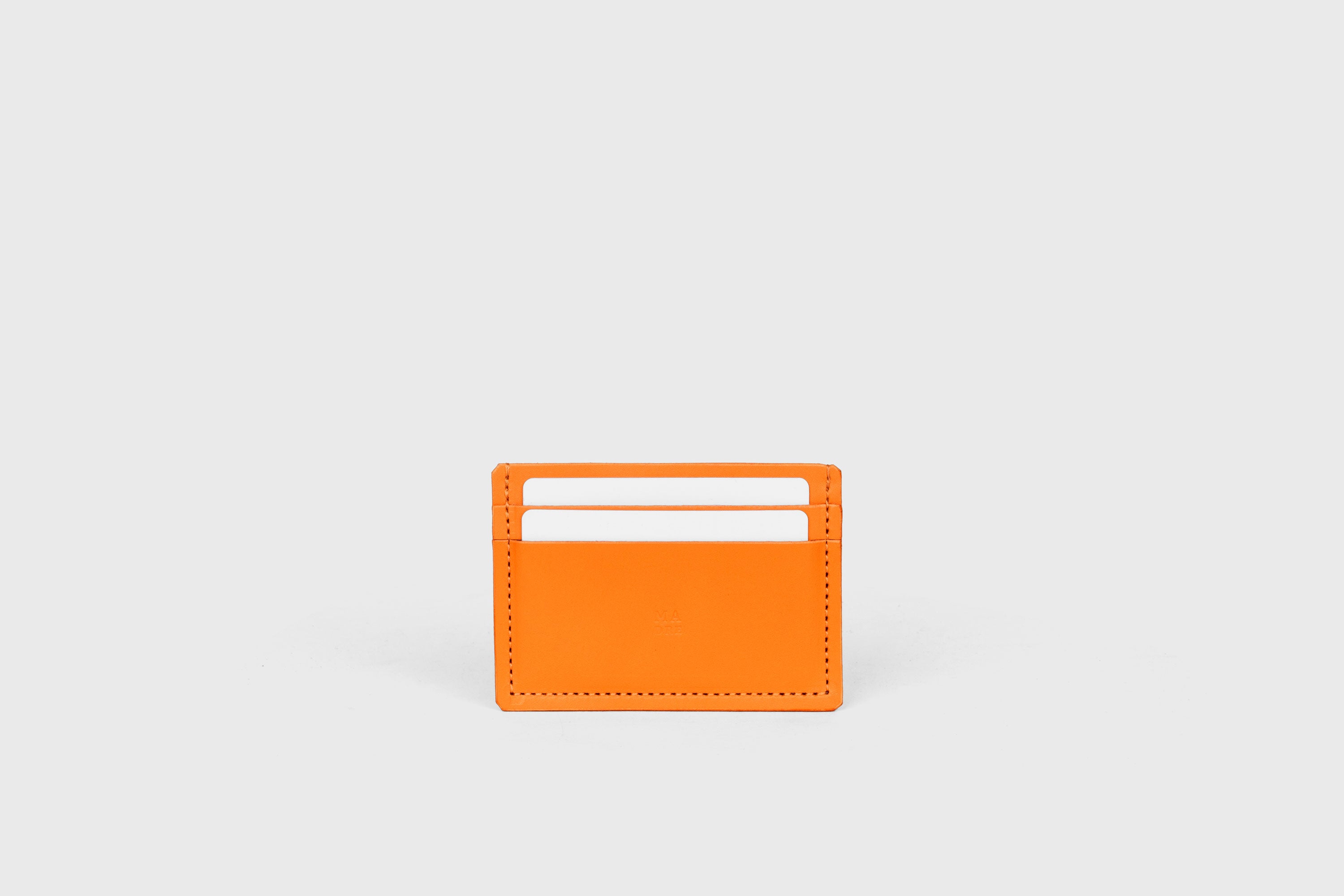 Credit Card Wallet Minimalist In Orange Color Leather Vegetable Tanned Leather Handmade and Design by Atelier Madre Manuel Dreesmann Barcelona Spain