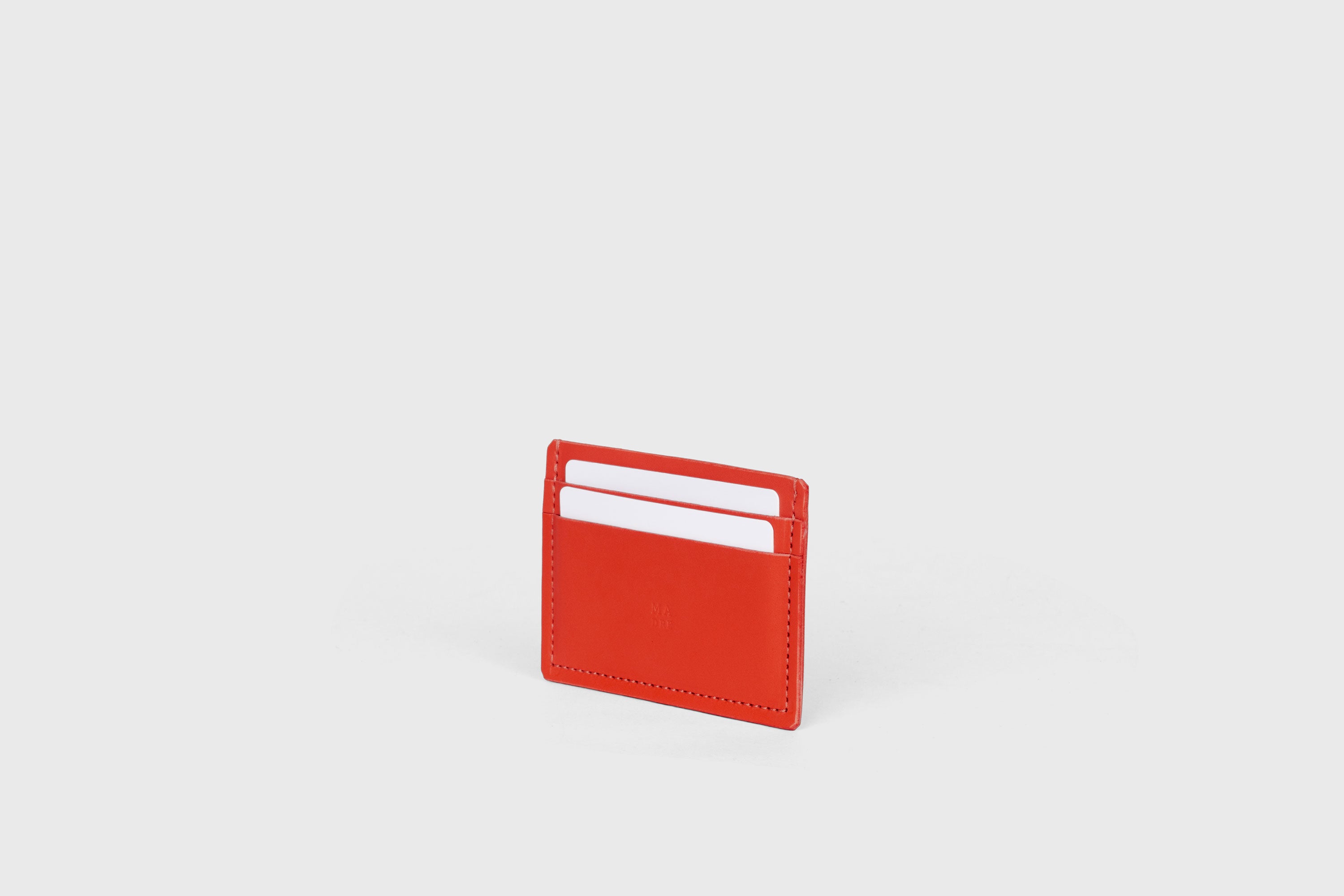 Credit Card Wallet Minimalist In Red Color Leather Vegetable Tanned Leather Handmade and Design by Atelier Madre Manuel Dreesmann Barcelona Spain