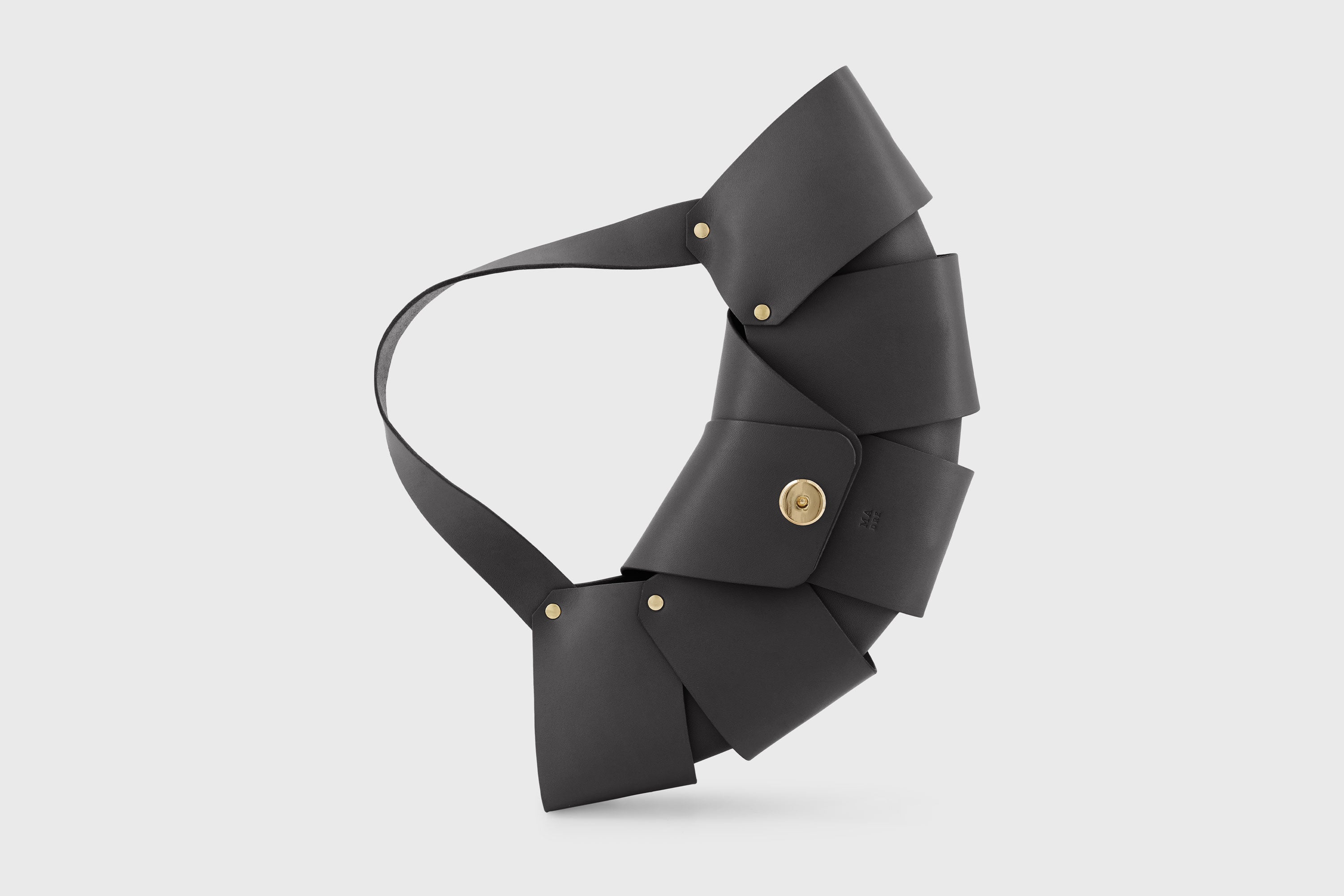 Croissant Bag Black Color Leather Magnetic Closure Full Grain Vegetable Tanned Leather High Quality Modern Minimalistic Organic Design Full Brass Rivets Atelier Madre Manuel Dreesmann Barcelona Spain