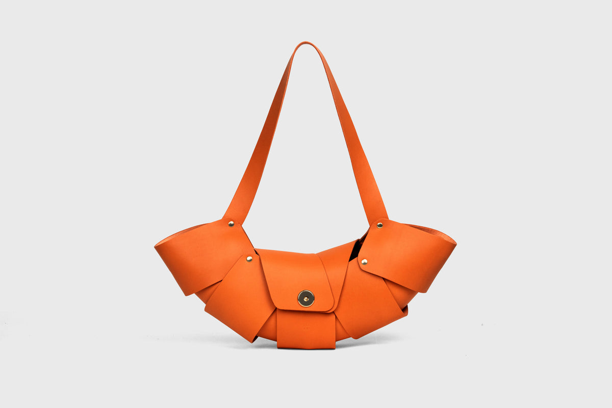 Croissant Bag Magnetic Closure Orange Color Leather Atelier Madre Manuel Dreesmann Barcelona Spain 1