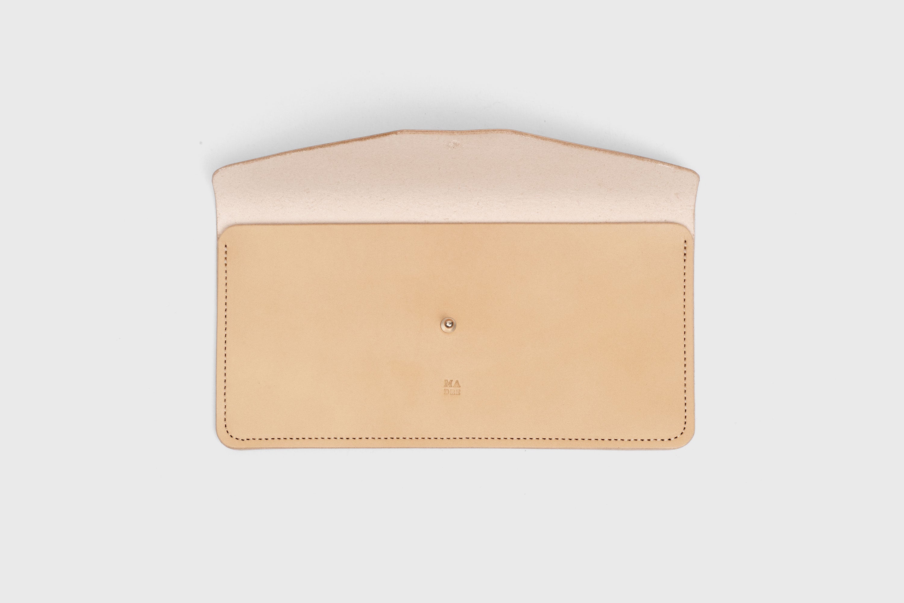 Document Holder In Natural Color In Vegetable Tanned Leather Minimalistic Design Atelier Madre Manuel Dreesmann Barcelona Spain
