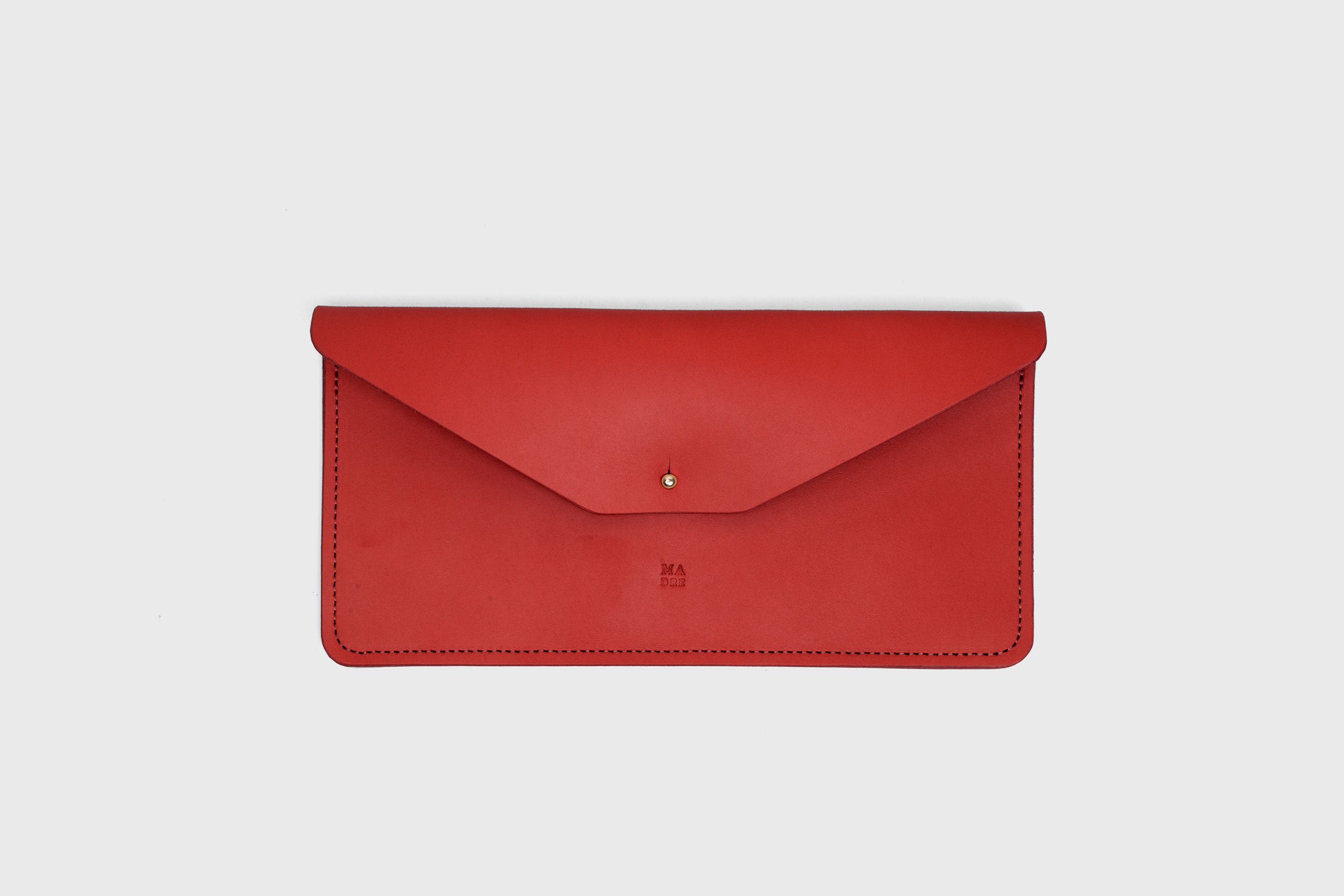 Document Holder In Red Color In Vegetable Tanned Leather Minimalistic Design Atelier Madre Manuel Dreesmann Barcelona Spain