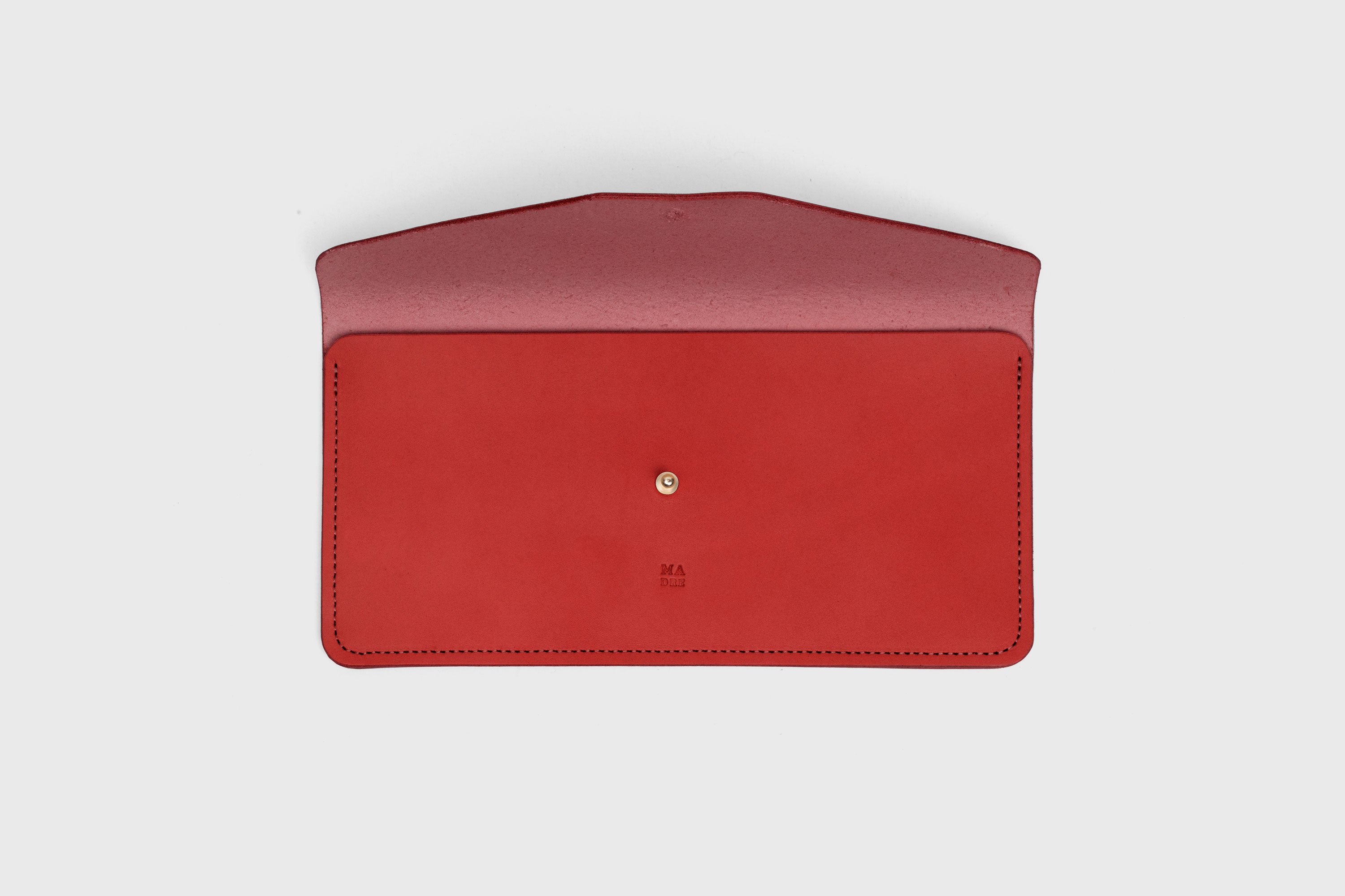 Document Holder In Red Color In Vegetable Tanned Leather Minimalistic Design Atelier Madre Manuel Dreesmann Barcelona Spain