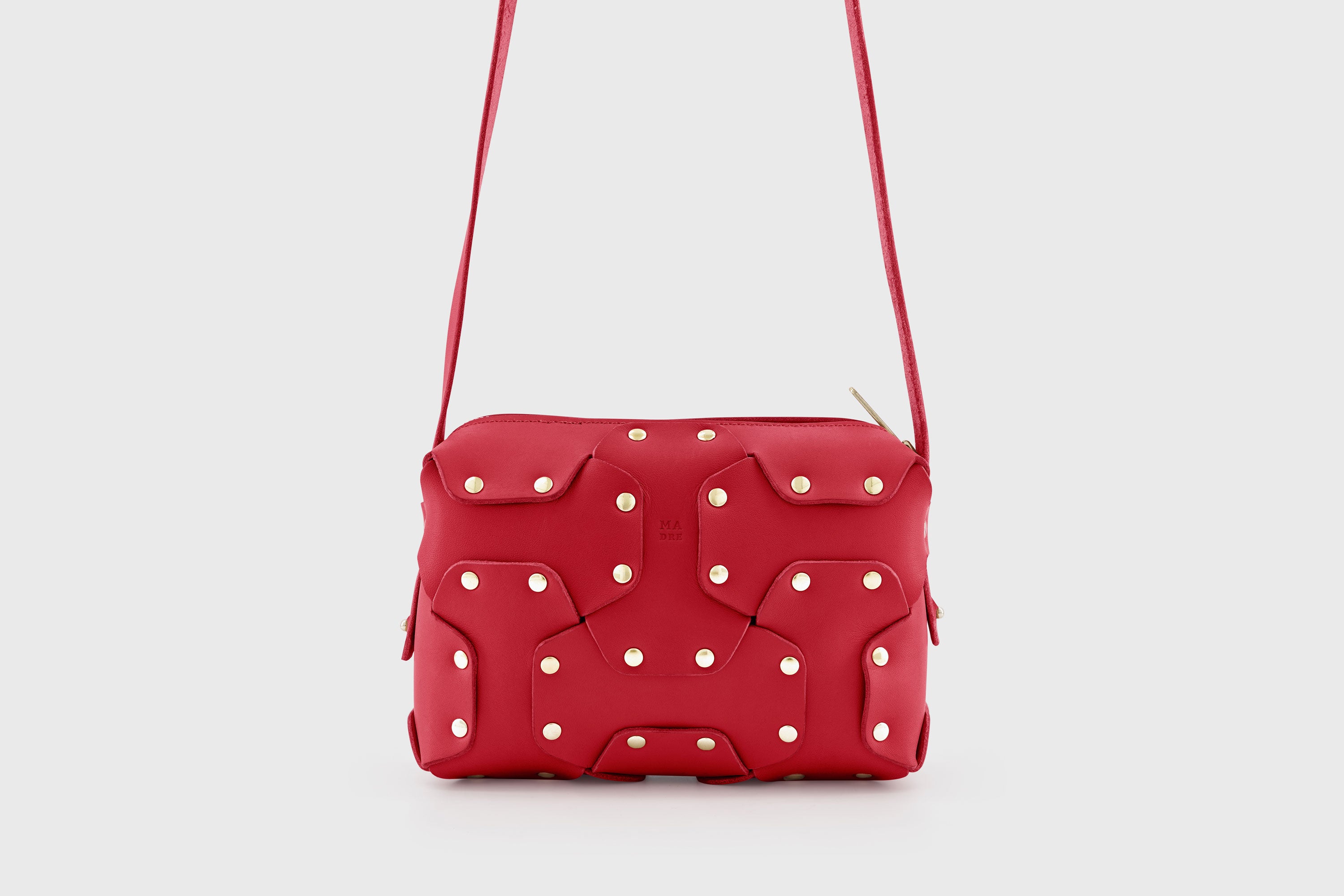 Double Rivet Bag Red Color Leather Full Grain Vegetable Tanned Leather Modern Minimalist Design Premium Quality Full Brass Clutch Crossbody Shoulder Bag Atelier Madre Manuel Dreesmann Barcelona Spain