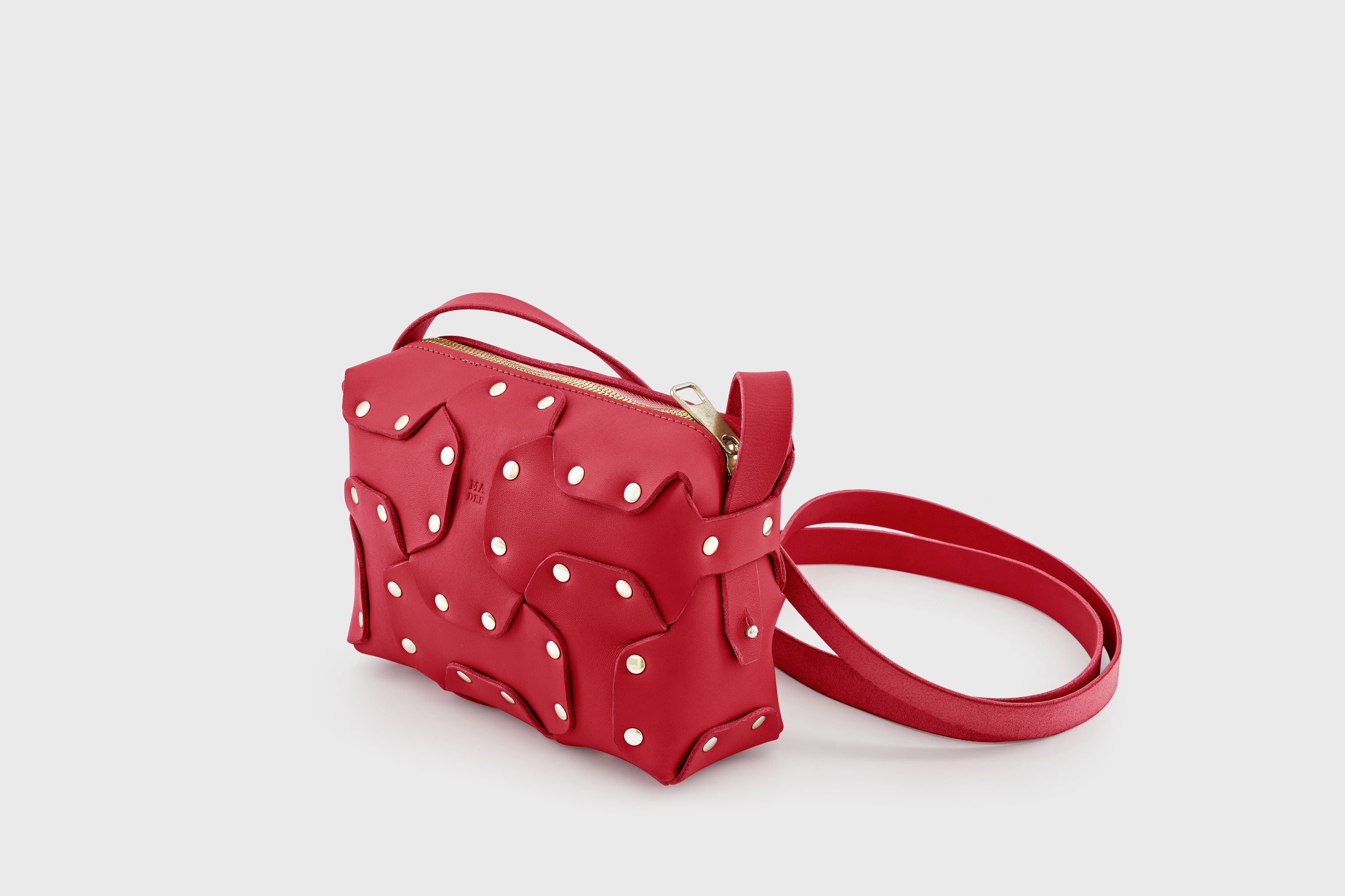 Double Rivet Bag Red Color Leather Full Grain Vegetable Tanned Leather Modern Minimalist Design Premium Quality Full Brass Clutch Crossbody Shoulder Bag Atelier Madre Manuel Dreesmann Barcelona Spain