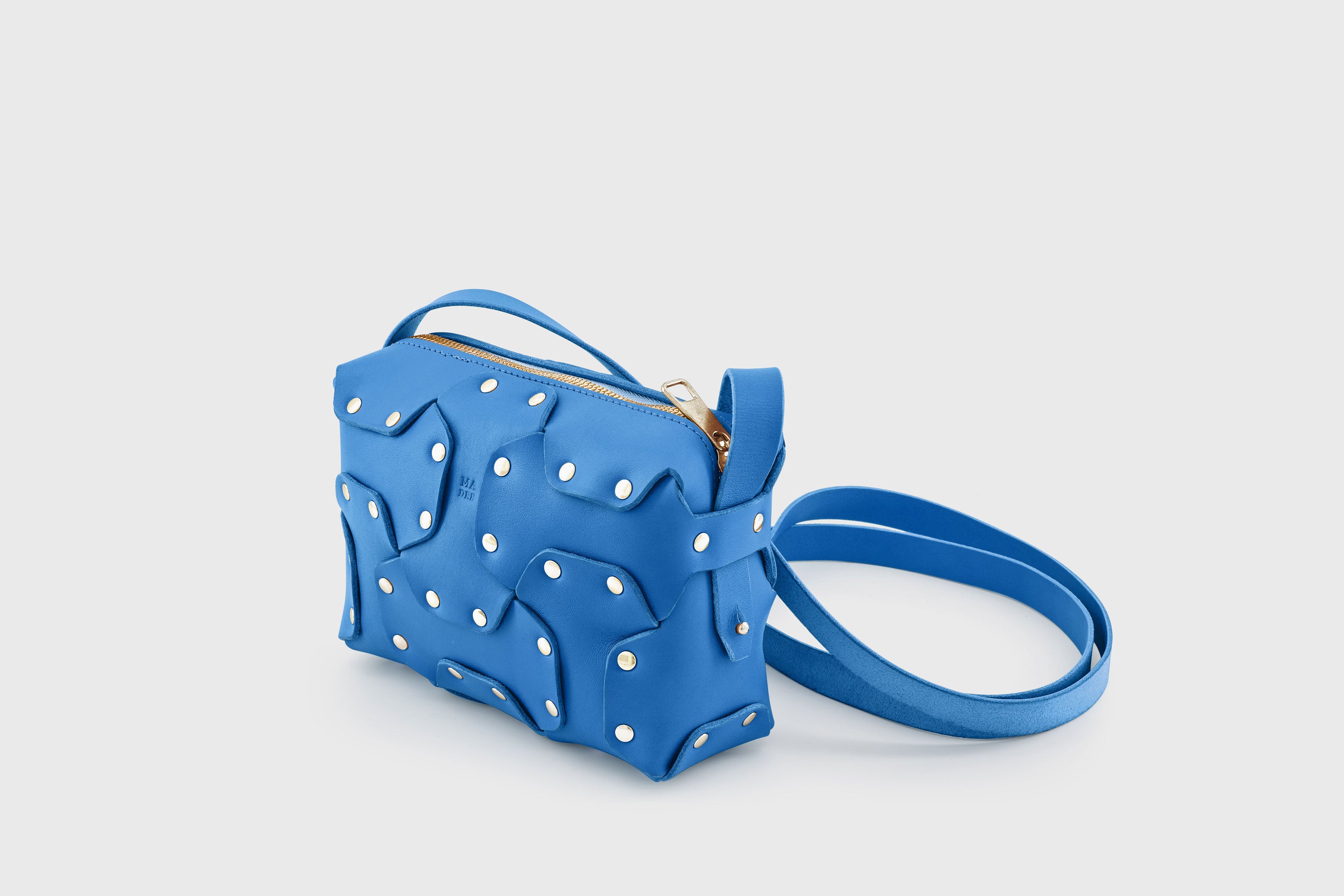Double Rivet Bag Royal Blue Color Leather Full Grain Vegetable Tanned Leather Modern Minimalist Design Premium Quality Full Brass Clutch Crossbody Shoulder Bag Atelier Madre Manuel Dreesmann Barcelona Spain