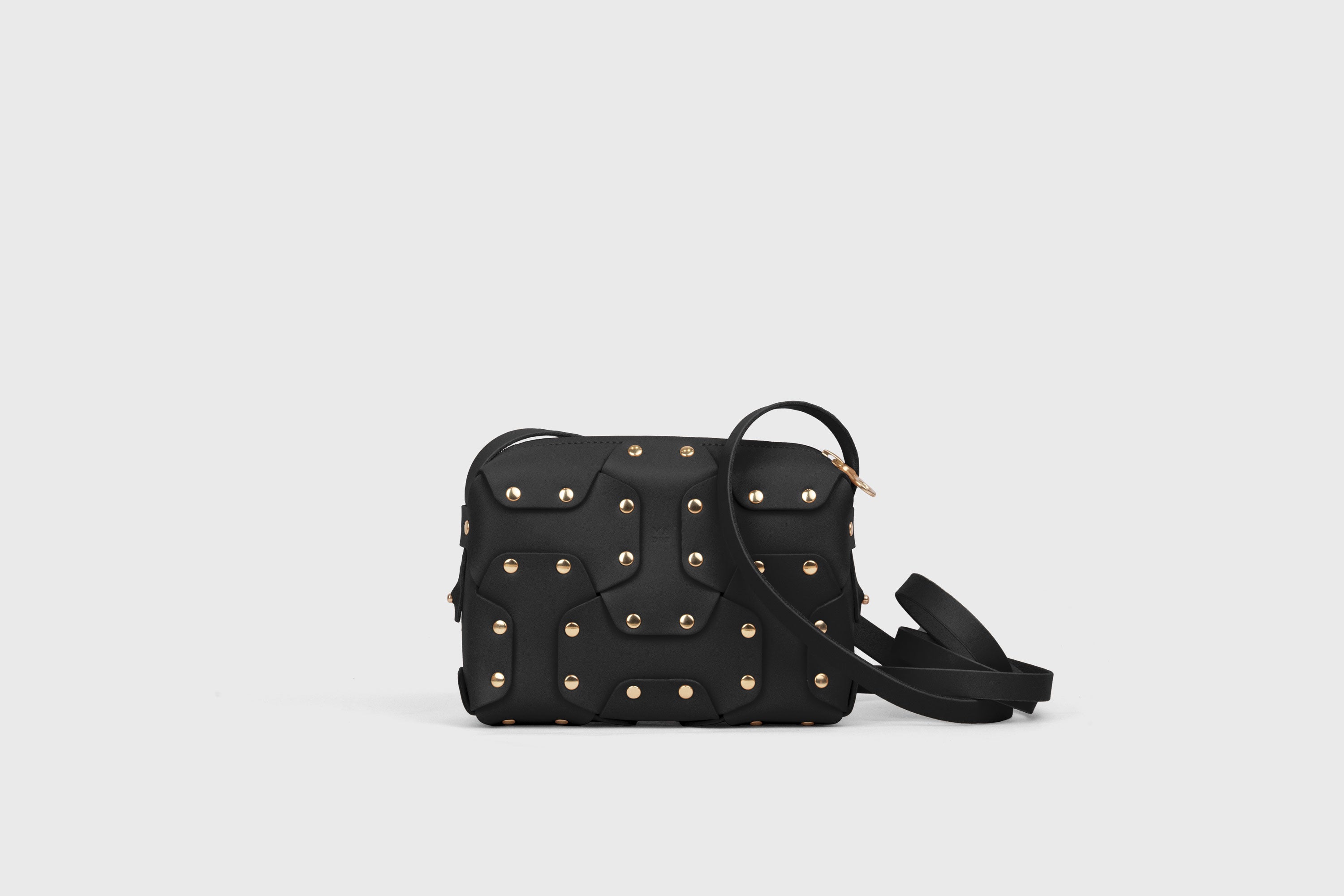 Double Rivet Bag, Black Color,  Leather Full Grain Vegetable Tanned Leather Modern Minimalist Design Premium Quality Full Brass Clutch Crossbody Shoulder Bag from Atelier Madre, Manuel Dreesmann Barcelona Spain