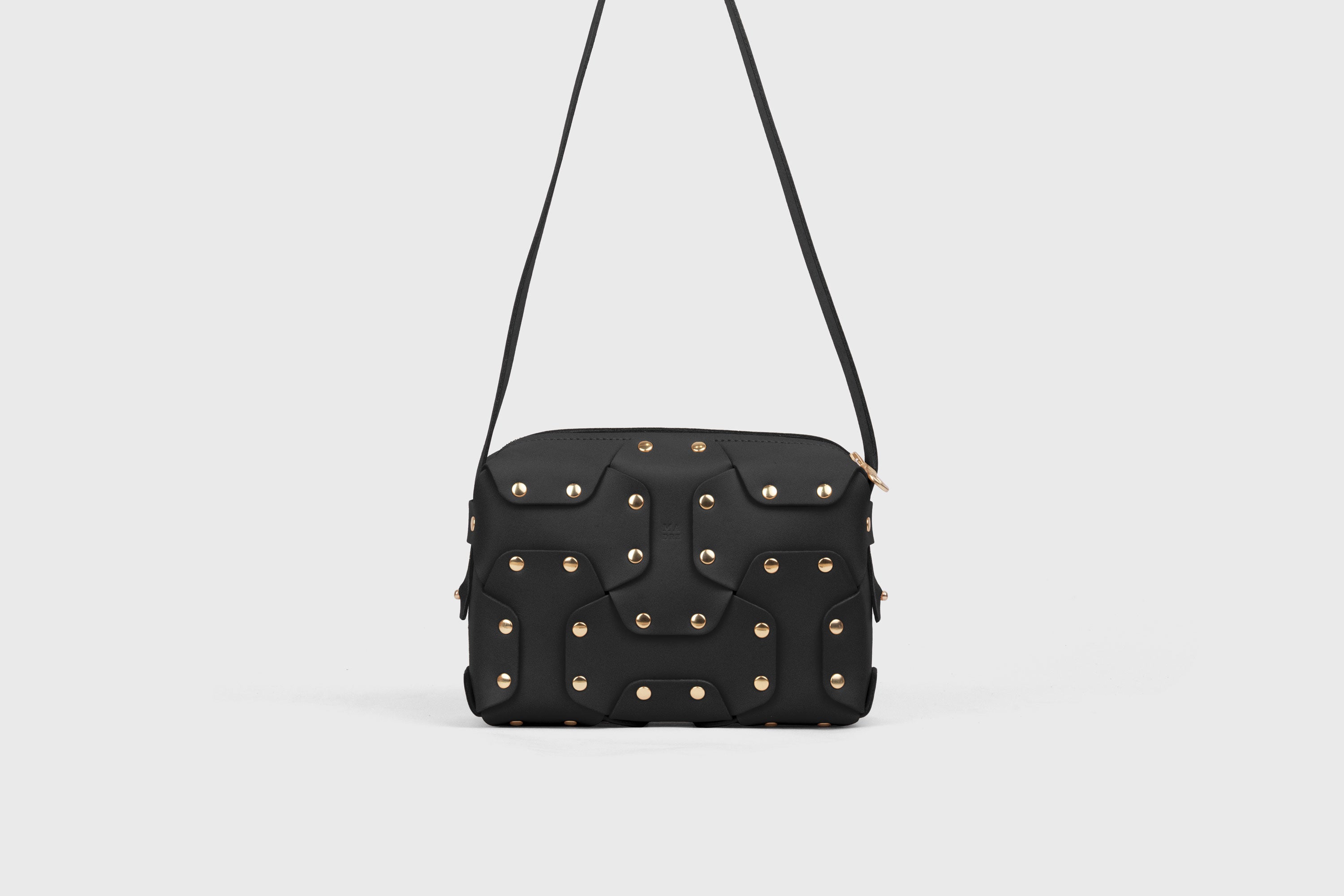 Double Rivet Bag, Black Color,  Leather Full Grain Vegetable Tanned Leather Modern Minimalist Design Premium Quality Full Brass Clutch Crossbody Shoulder Bag from Atelier Madre, Manuel Dreesmann Barcelona Spain