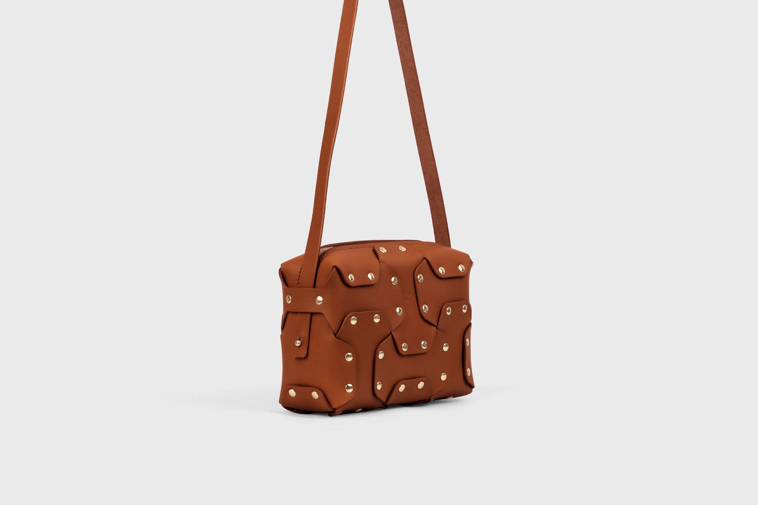 Double Rivet Bag, Dark-brown Color,  Leather Full Grain Vegetable Tanned Leather Modern Minimalist Design Premium Quality Full Brass Clutch Crossbody Shoulder Bag from Atelier Madre, Manuel Dreesmann Barcelona Spain
