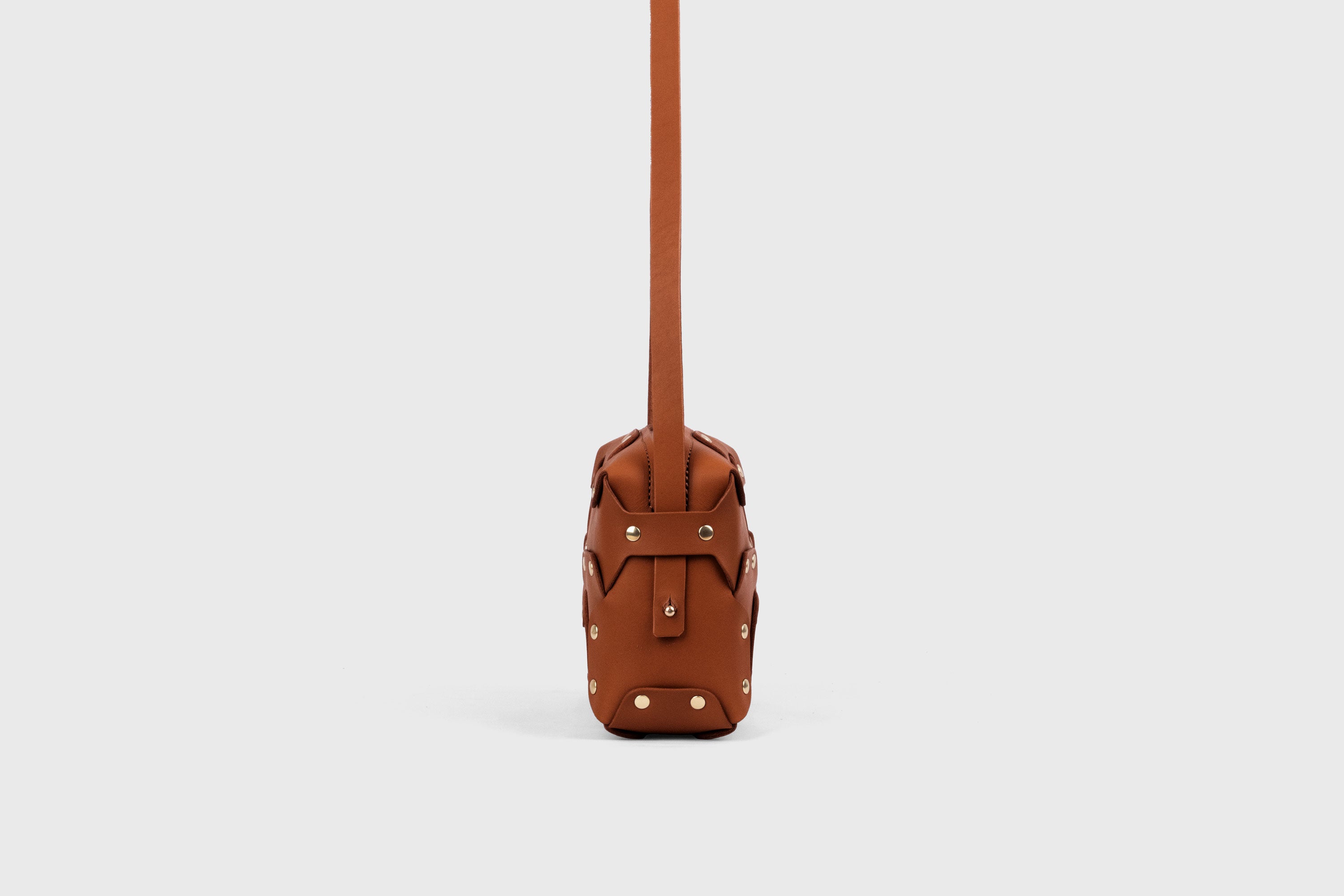 Double Rivet Bag, Dark-brown Color,  Leather Full Grain Vegetable Tanned Leather Modern Minimalist Design Premium Quality Full Brass Clutch Crossbody Shoulder Bag from Atelier Madre, Manuel Dreesmann Barcelona Spain