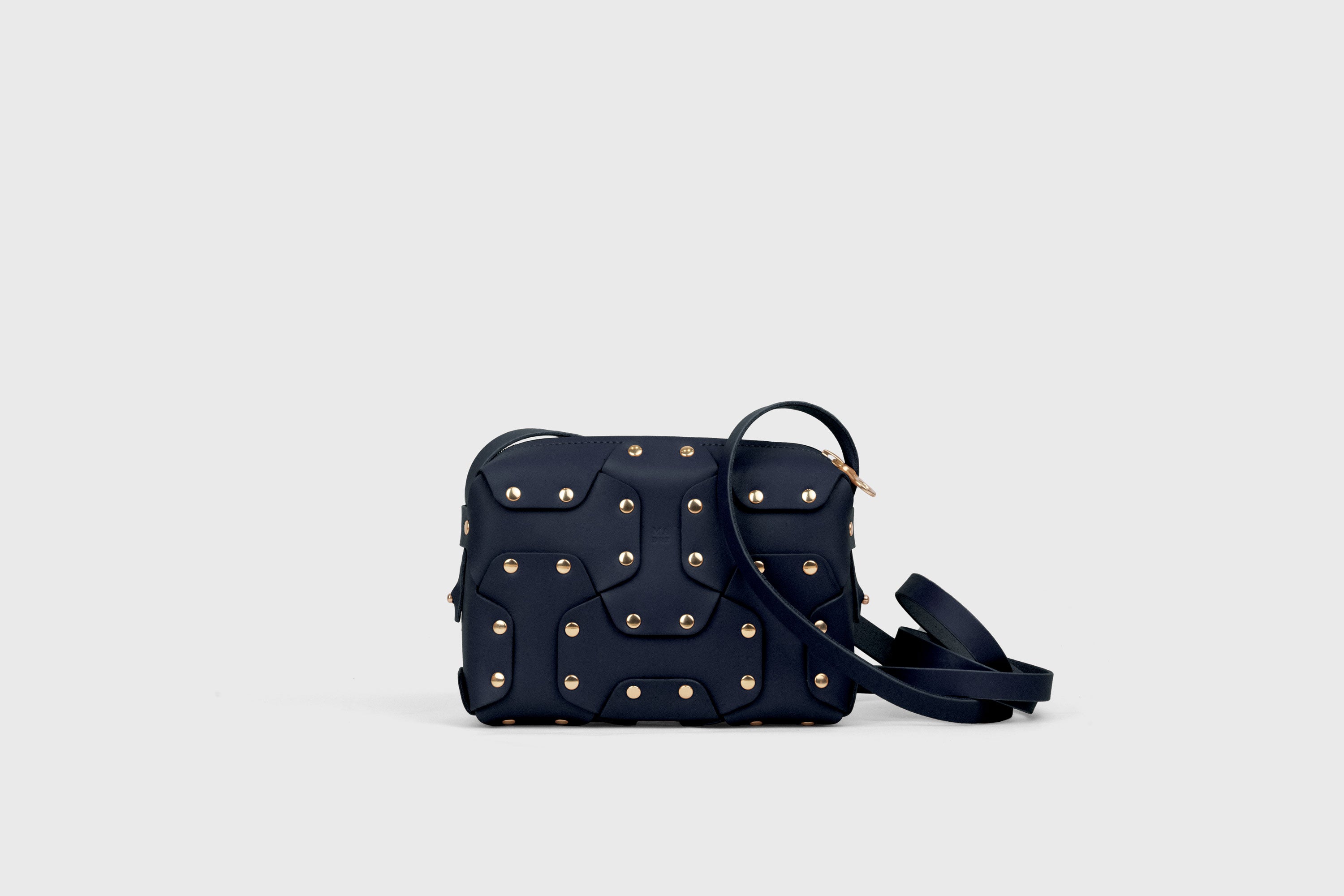 Double Rivet Bag, Marine Blue Color,  Leather Full Grain Vegetable Tanned Leather Modern Minimalist Design Premium Quality Full Brass Clutch Crossbody Shoulder Bag from Atelier Madre, Manuel Dreesmann Barcelona Spain