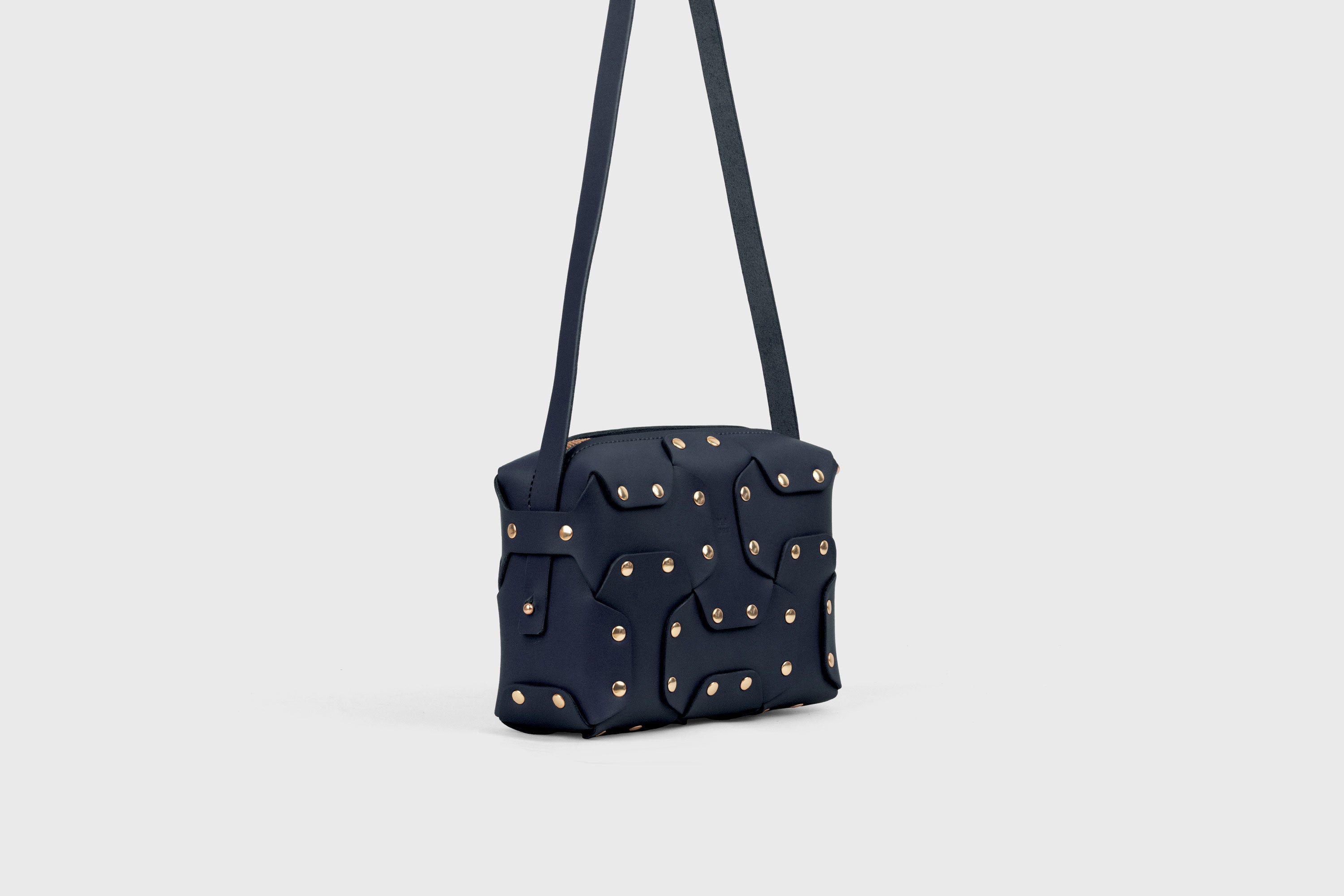 Double Rivet Bag, Marine Blue Color,  Leather Full Grain Vegetable Tanned Leather Modern Minimalist Design Premium Quality Full Brass Clutch Crossbody Shoulder Bag from Atelier Madre, Manuel Dreesmann Barcelona Spain