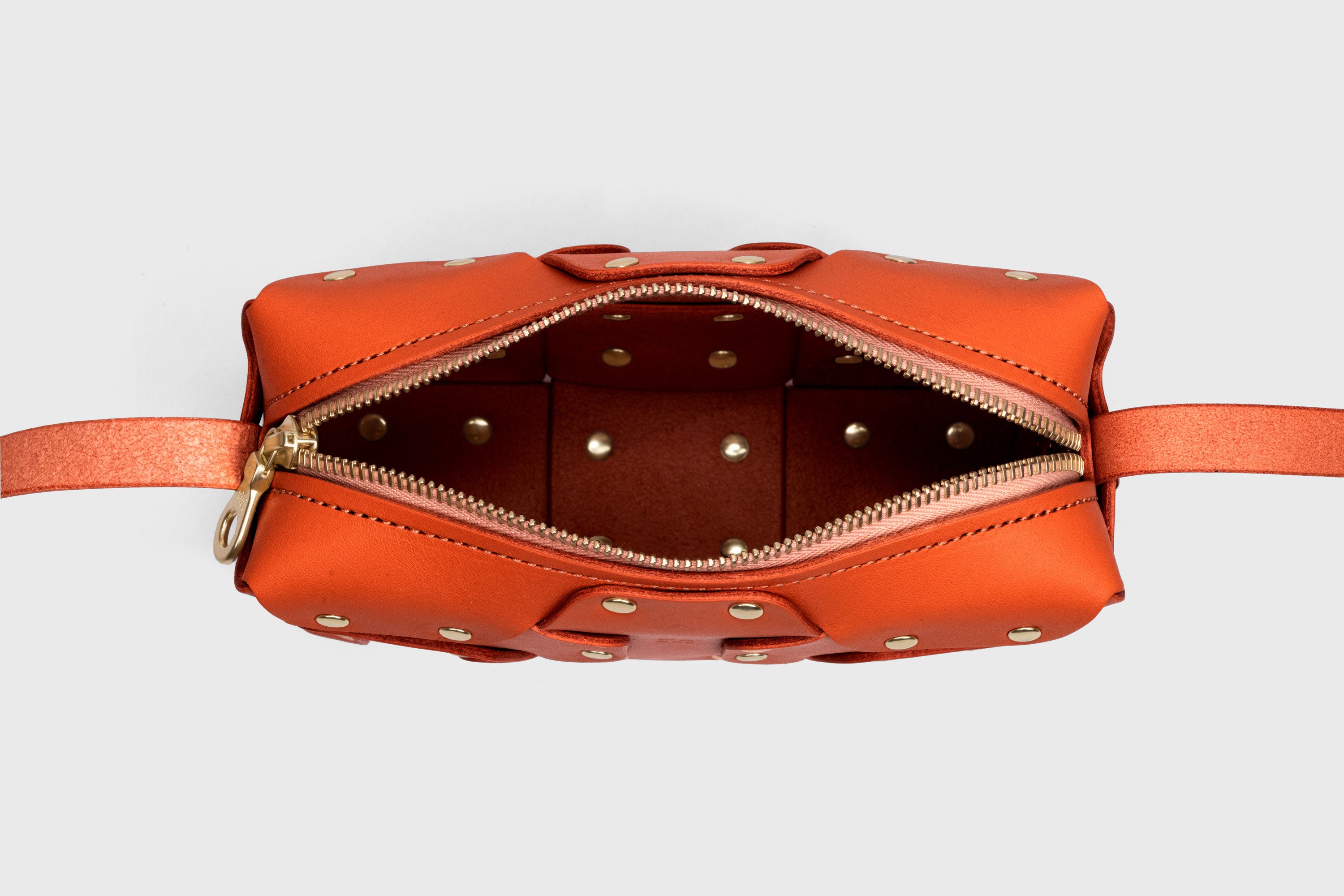 Double Rivet Bag, Orange Color,  Leather Full Grain Vegetable Tanned Leather Modern Minimalist Design Premium Quality Full Brass Clutch Crossbody Shoulder Bag from Atelier Madre, Manuel Dreesmann Barcelona Spain