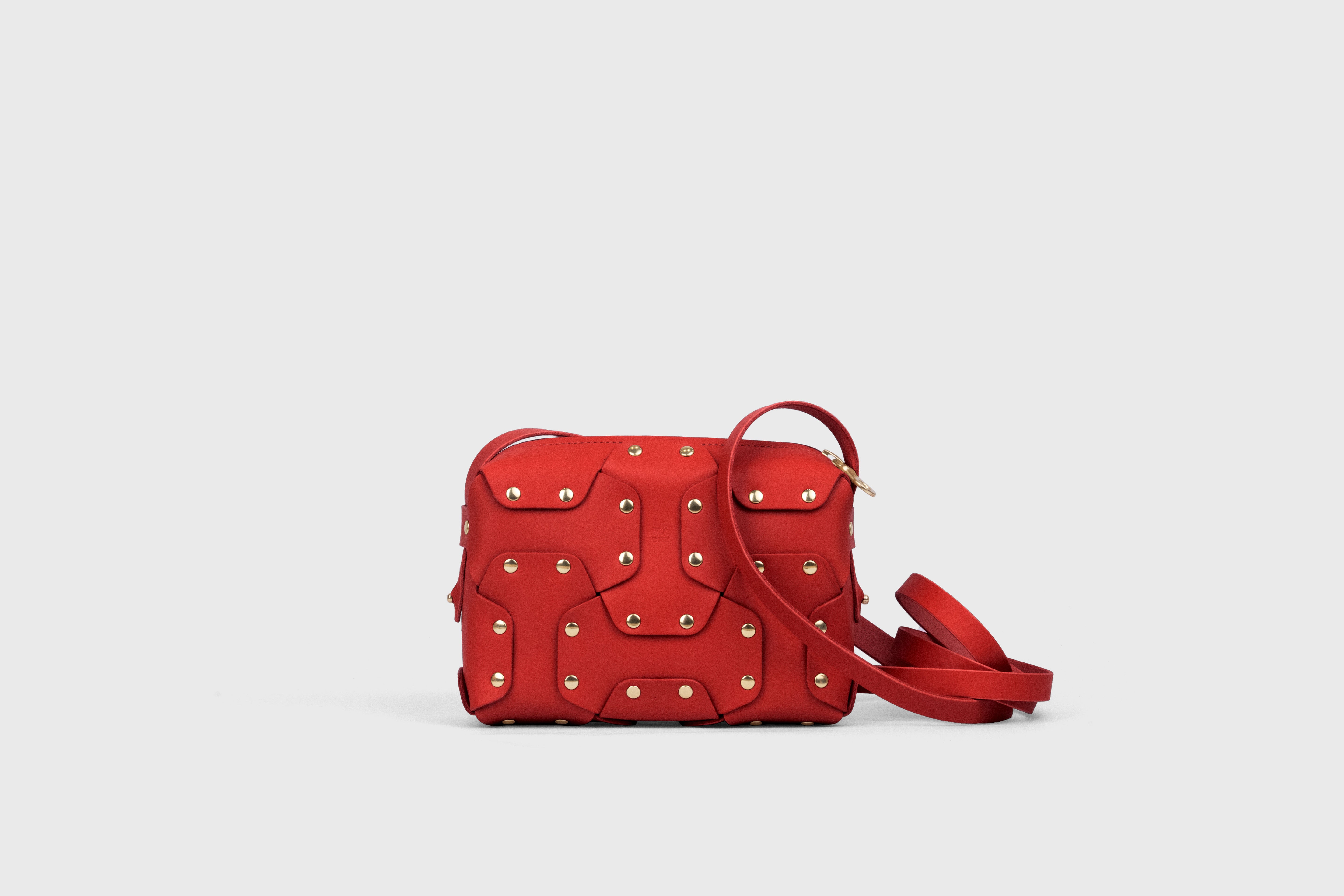 Double Rivet Bag, Red Color,  Leather Full Grain Vegetable Tanned Leather Modern Minimalist Design Premium Quality Full Brass Clutch Crossbody Shoulder Bag from Atelier Madre, Manuel Dreesmann Barcelona Spain