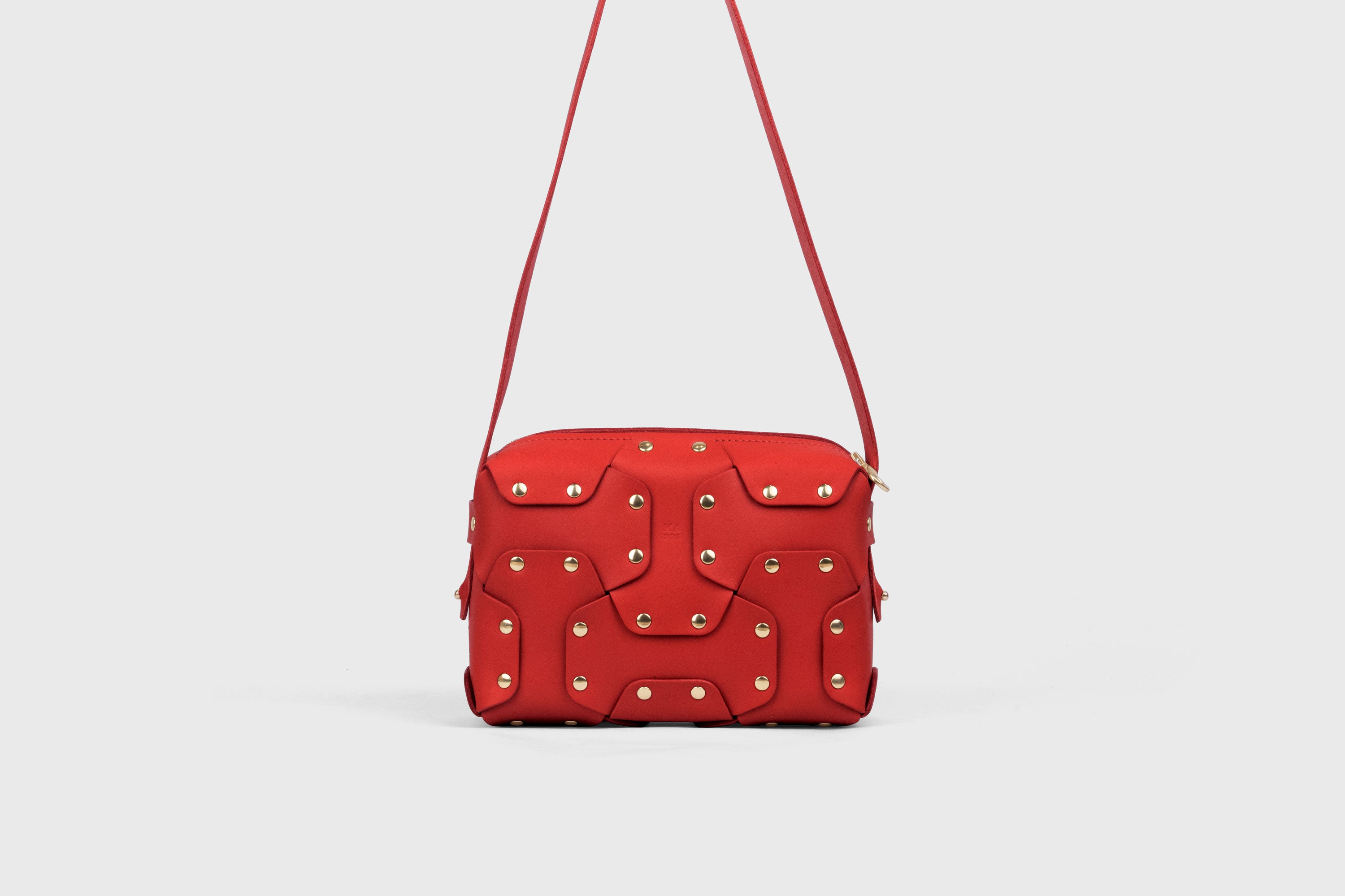 Double Rivet Bag, Red Color,  Leather Full Grain Vegetable Tanned Leather Modern Minimalist Design Premium Quality Full Brass Clutch Crossbody Shoulder Bag from Atelier Madre, Manuel Dreesmann Barcelona Spain