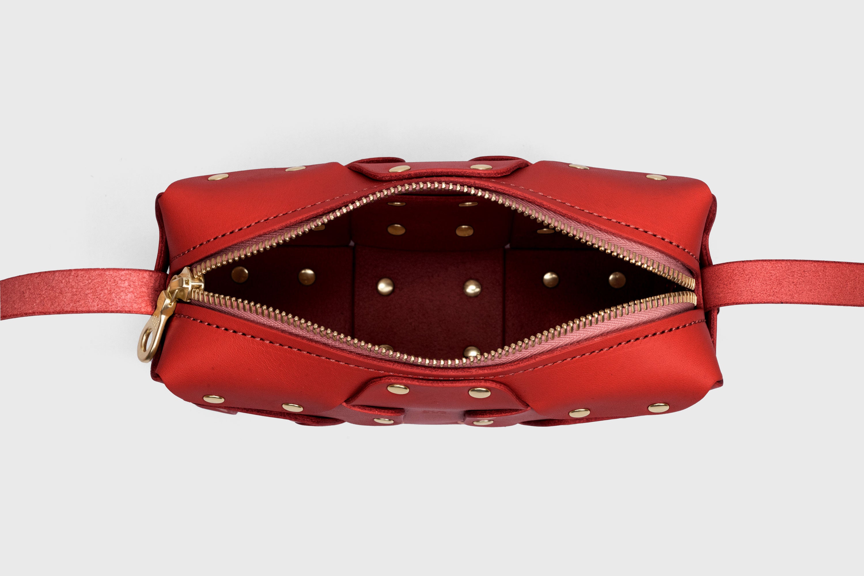 Double Rivet Bag, Red Color,  Leather Full Grain Vegetable Tanned Leather Modern Minimalist Design Premium Quality Full Brass Clutch Crossbody Shoulder Bag from Atelier Madre, Manuel Dreesmann Barcelona Spain