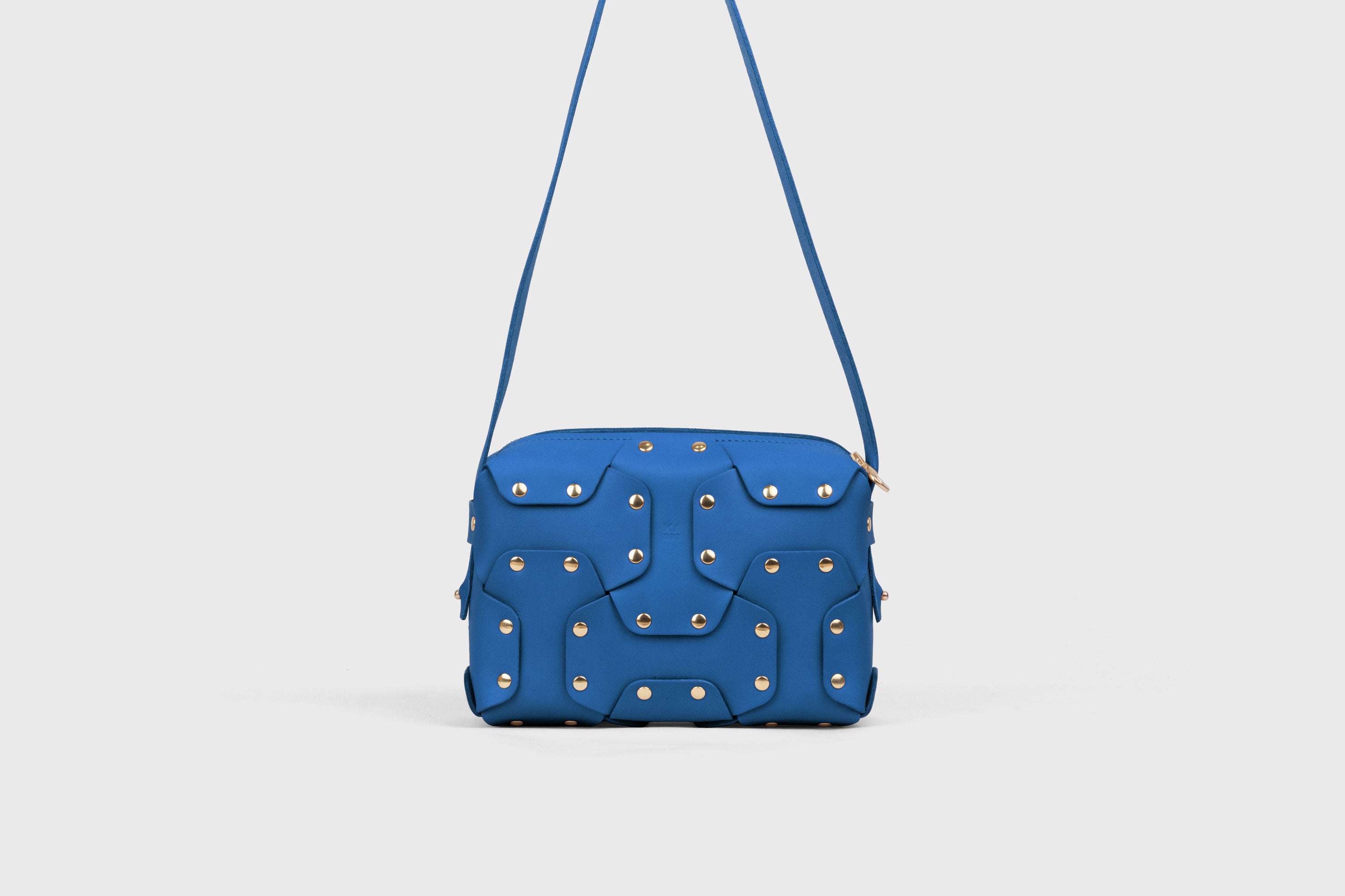 Double Rivet Bag, Royal Blue Color,  Leather Full Grain Vegetable Tanned Leather Modern Minimalist Design Premium Quality Full Brass Clutch Crossbody Shoulder Bag from Atelier Madre, Manuel Dreesmann Barcelona Spain