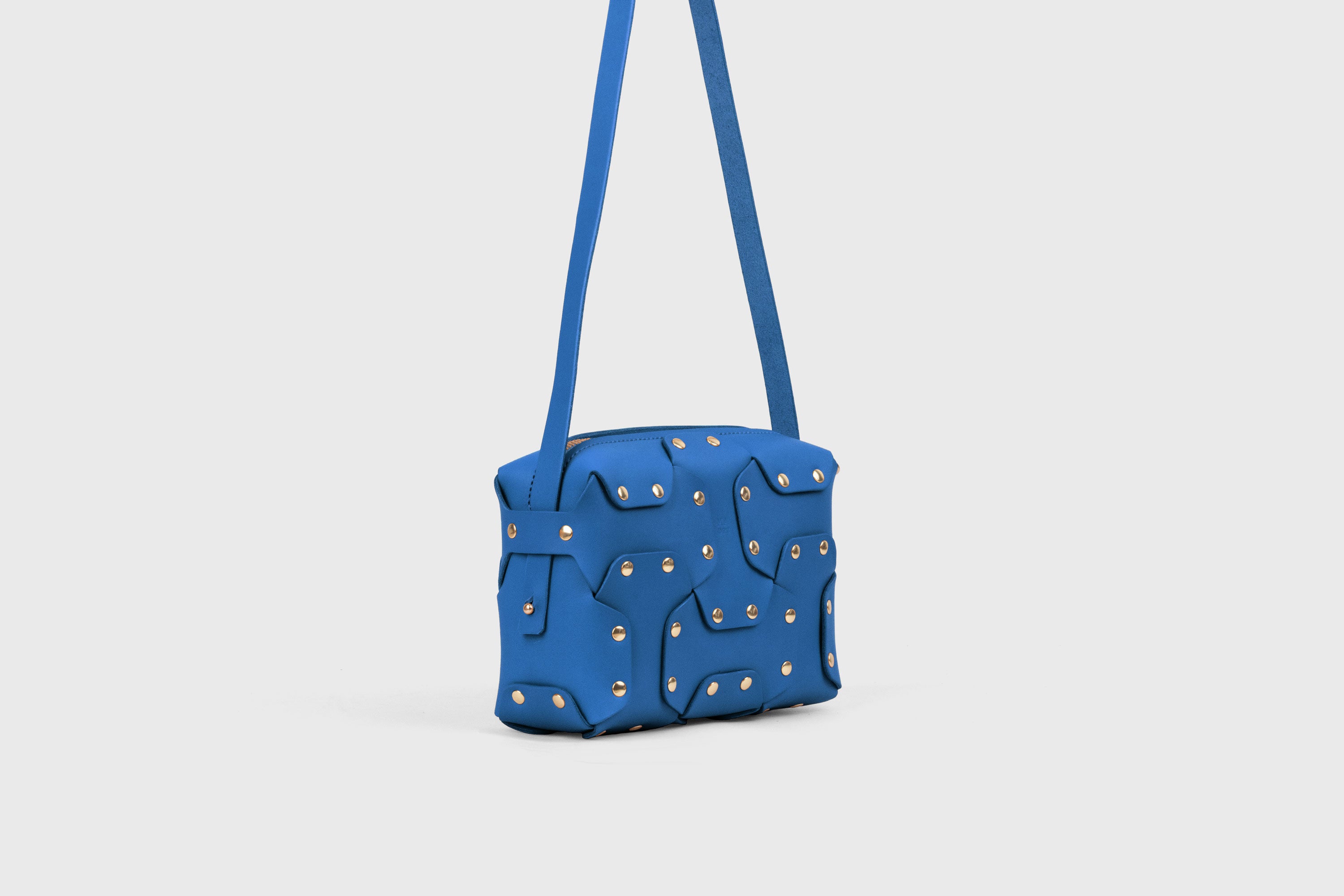 Double Rivet Bag, Royal Blue Color,  Leather Full Grain Vegetable Tanned Leather Modern Minimalist Design Premium Quality Full Brass Clutch Crossbody Shoulder Bag from Atelier Madre, Manuel Dreesmann Barcelona Spain