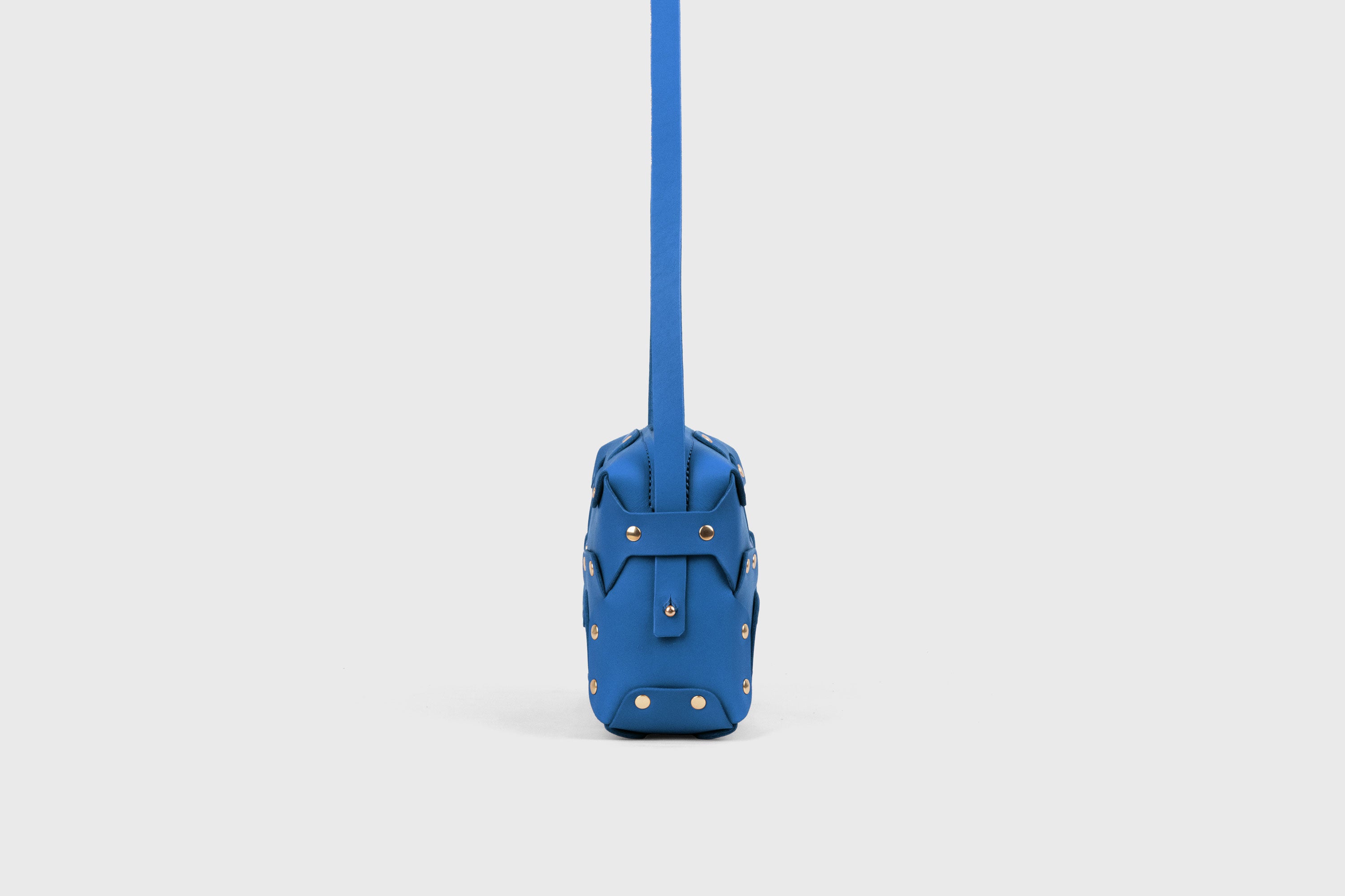 Double Rivet Bag, Royal Blue Color,  Leather Full Grain Vegetable Tanned Leather Modern Minimalist Design Premium Quality Full Brass Clutch Crossbody Shoulder Bag from Atelier Madre, Manuel Dreesmann Barcelona Spain