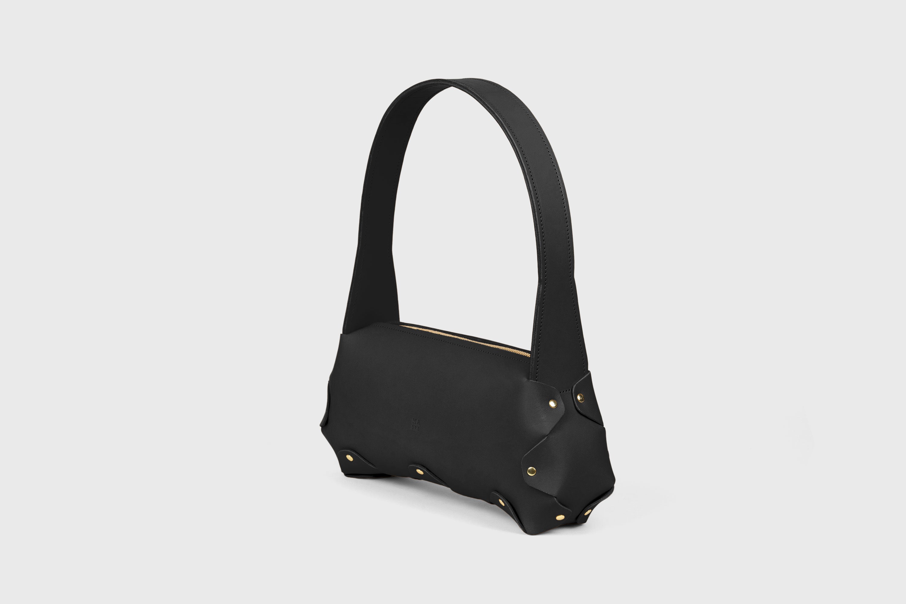 Fiona Bag In Black Color In Full Grain Vegetable Tanned Leather Minimalistic Design Shoulder Bag Atelier Madre Manuel Dreesmann Barcelona Spain