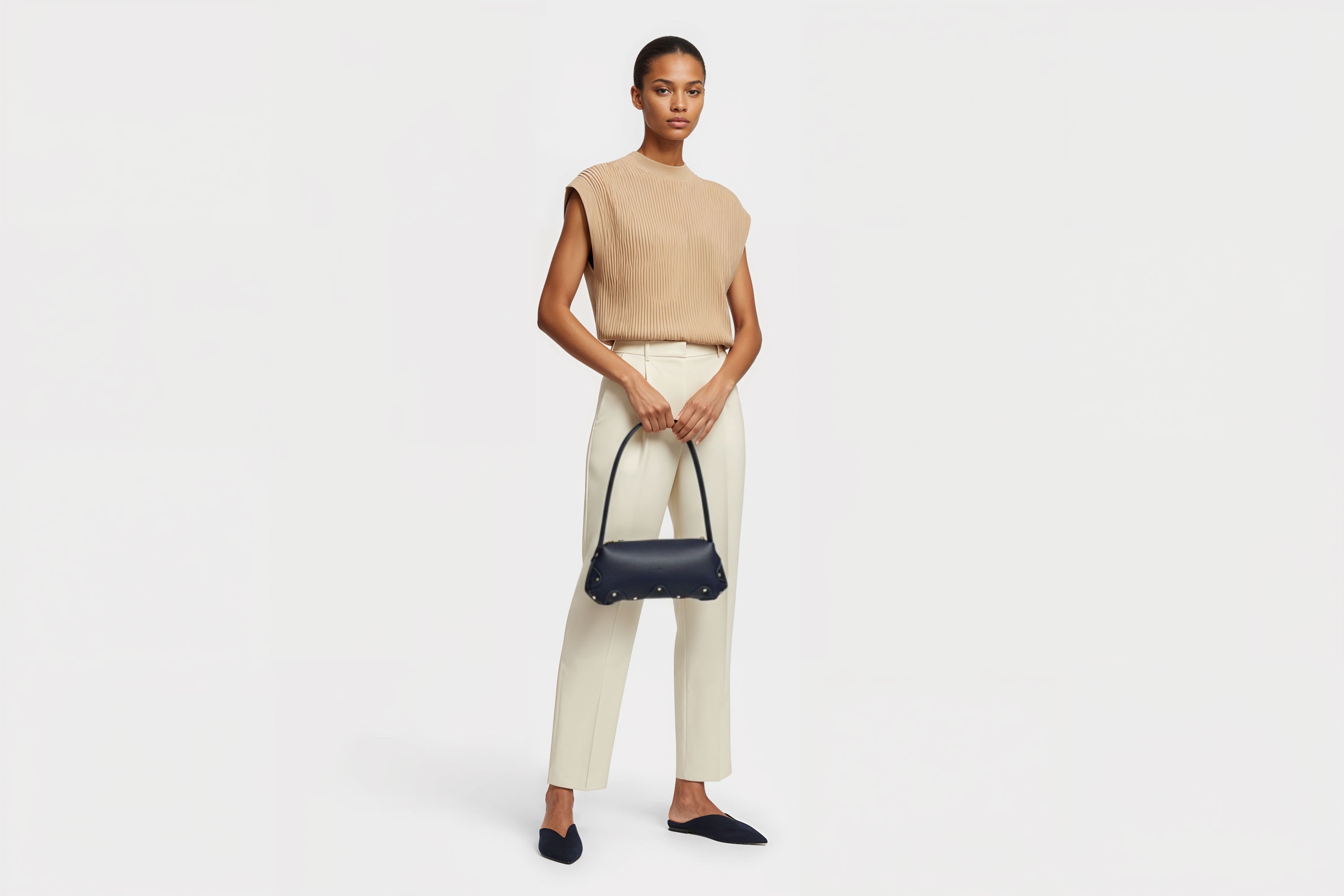 Fiona Bag Marine Blue Colour Leather On Woman Model Bright Background Vegetable Tanned Leather Modern Minimalist Design Premium Quality Atelier Madre Manuel Dreesmann Barcelona Spain