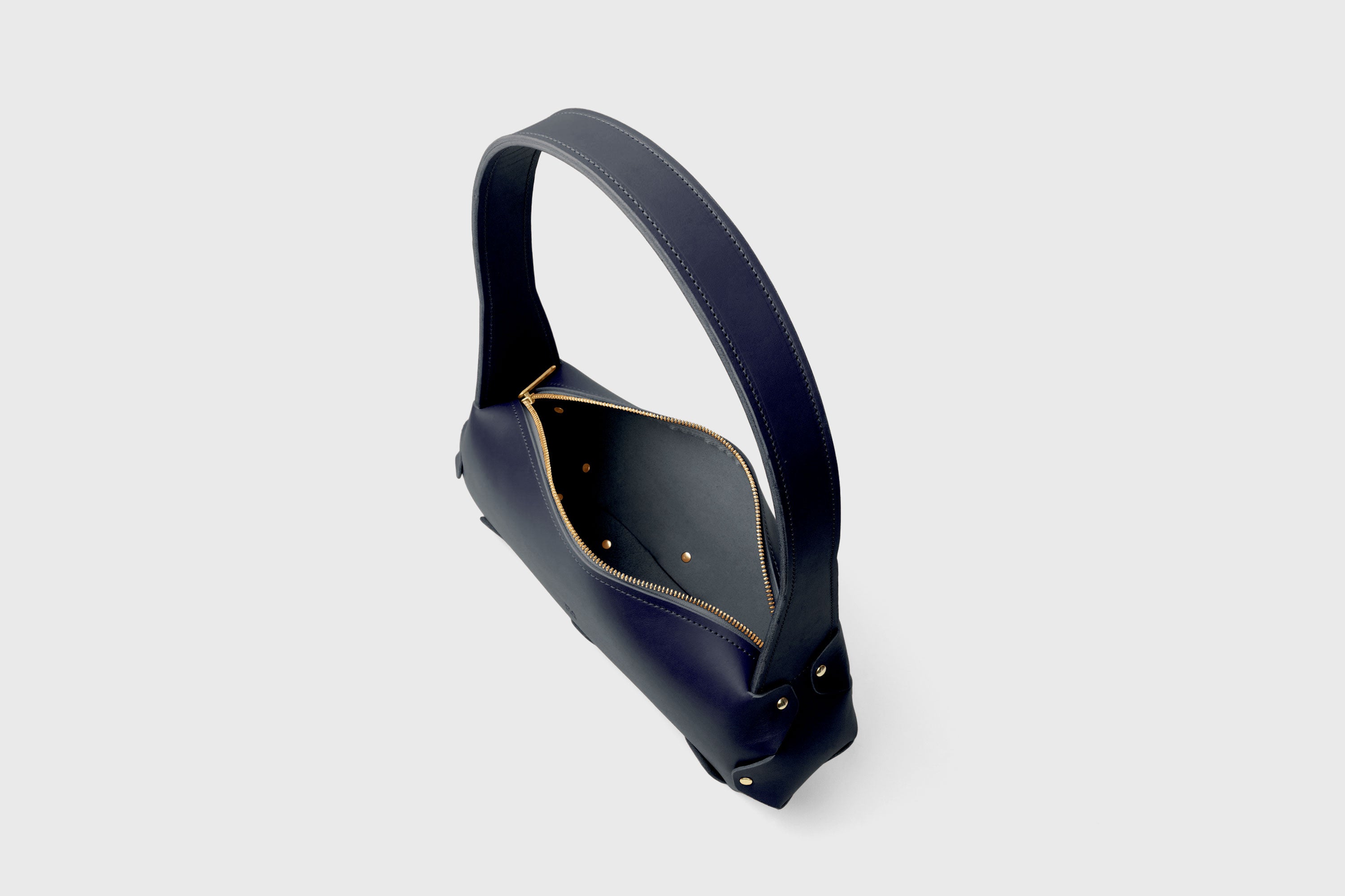 Fiona Bag In Marine Blue Color In Full Grain Vegetable Tanned Leather Minimalistic Design Shoulder Bag Atelier Madre Manuel Dreesmann Barcelona Spain