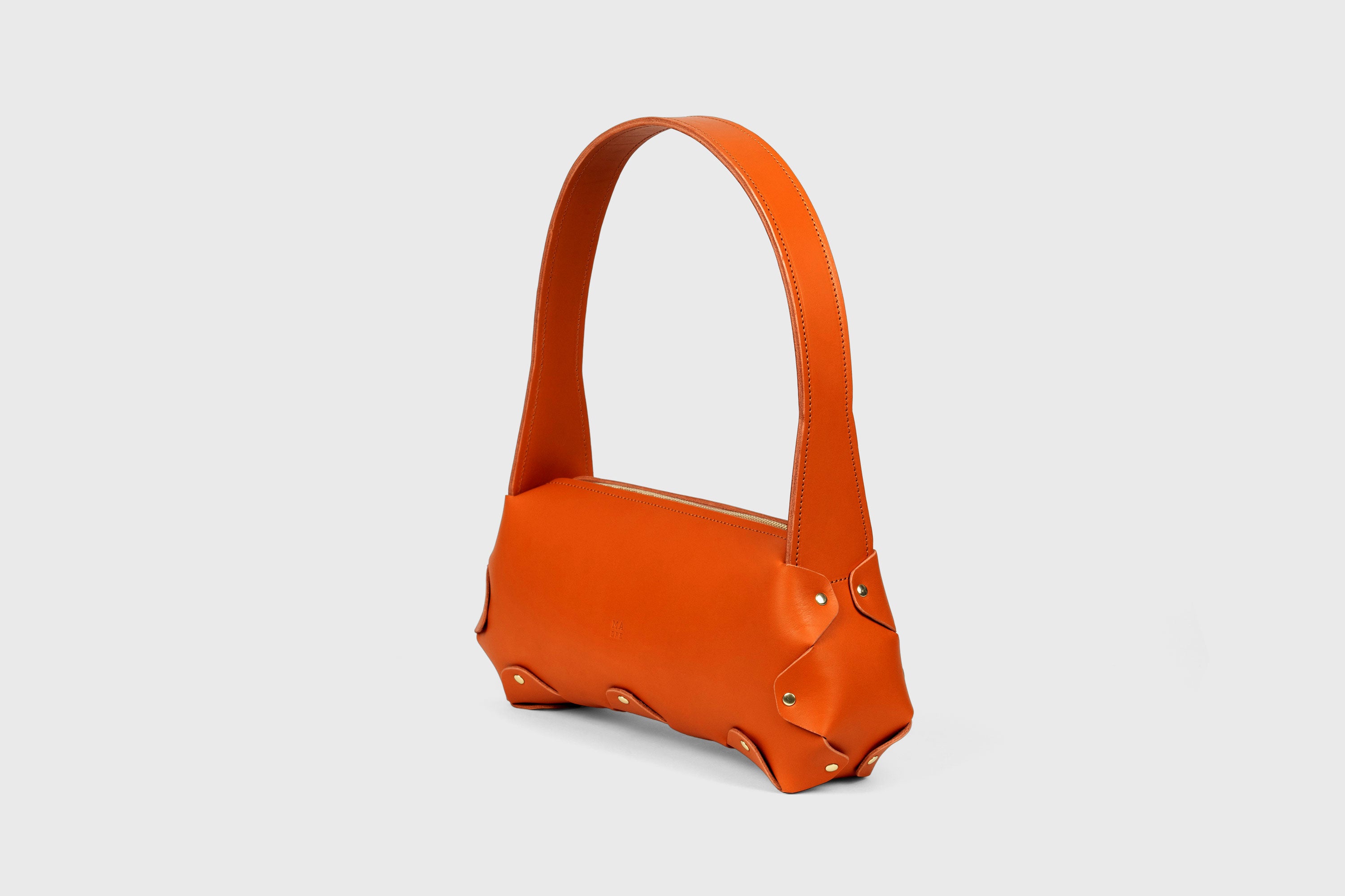 Fiona Bag In Orange Color In Full Grain Vegetable Tanned Leather Minimalistic Design Shoulder Bag Atelier Madre Manuel Dreesmann Barcelona Spain