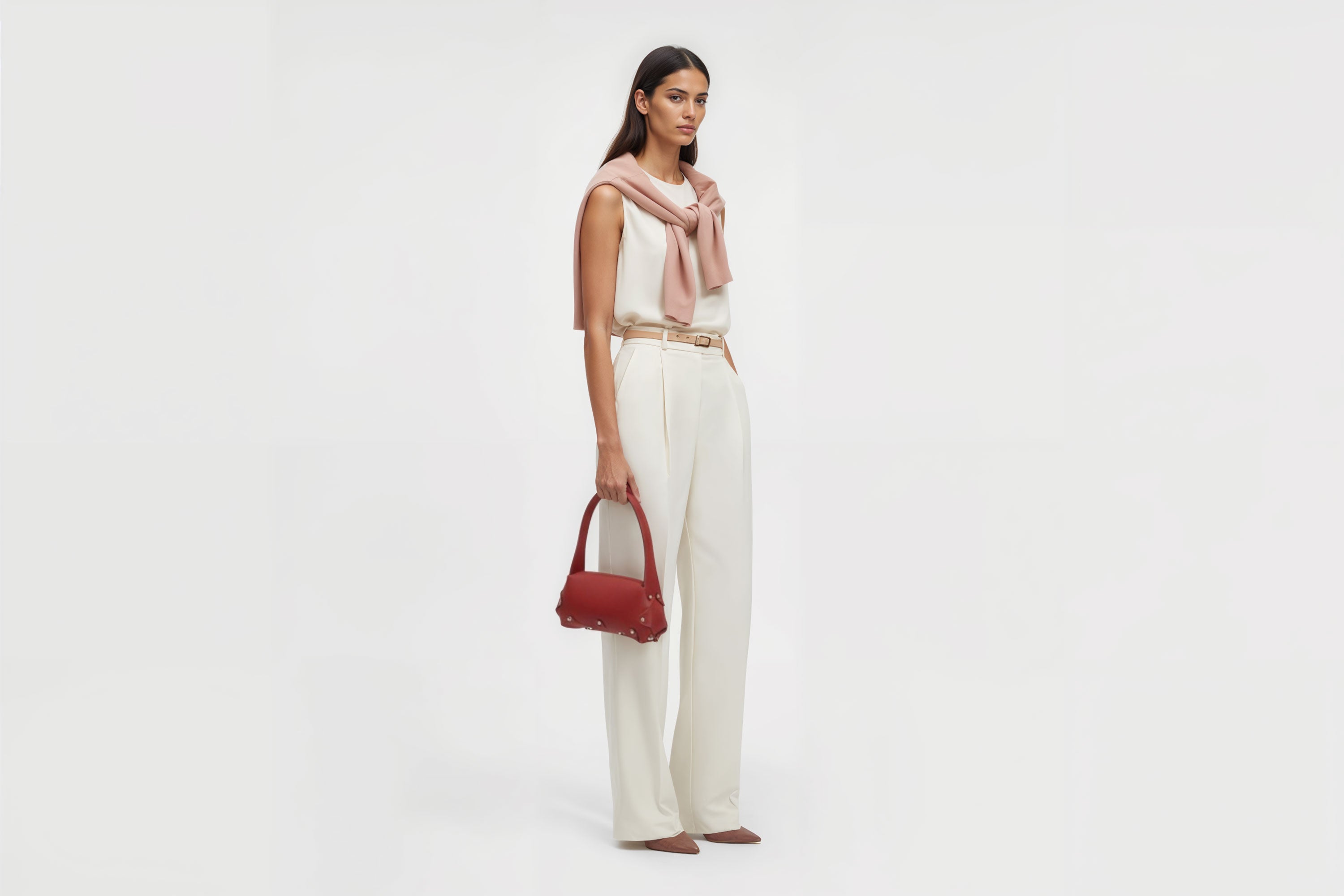 Fiona Bag Red Color Leather On Woman Model Bright Background Vegetable Tanned Leather Modern Minimalist Design Premium Quality Atelier Madre Manuel Dreesmann Barcelona Spain