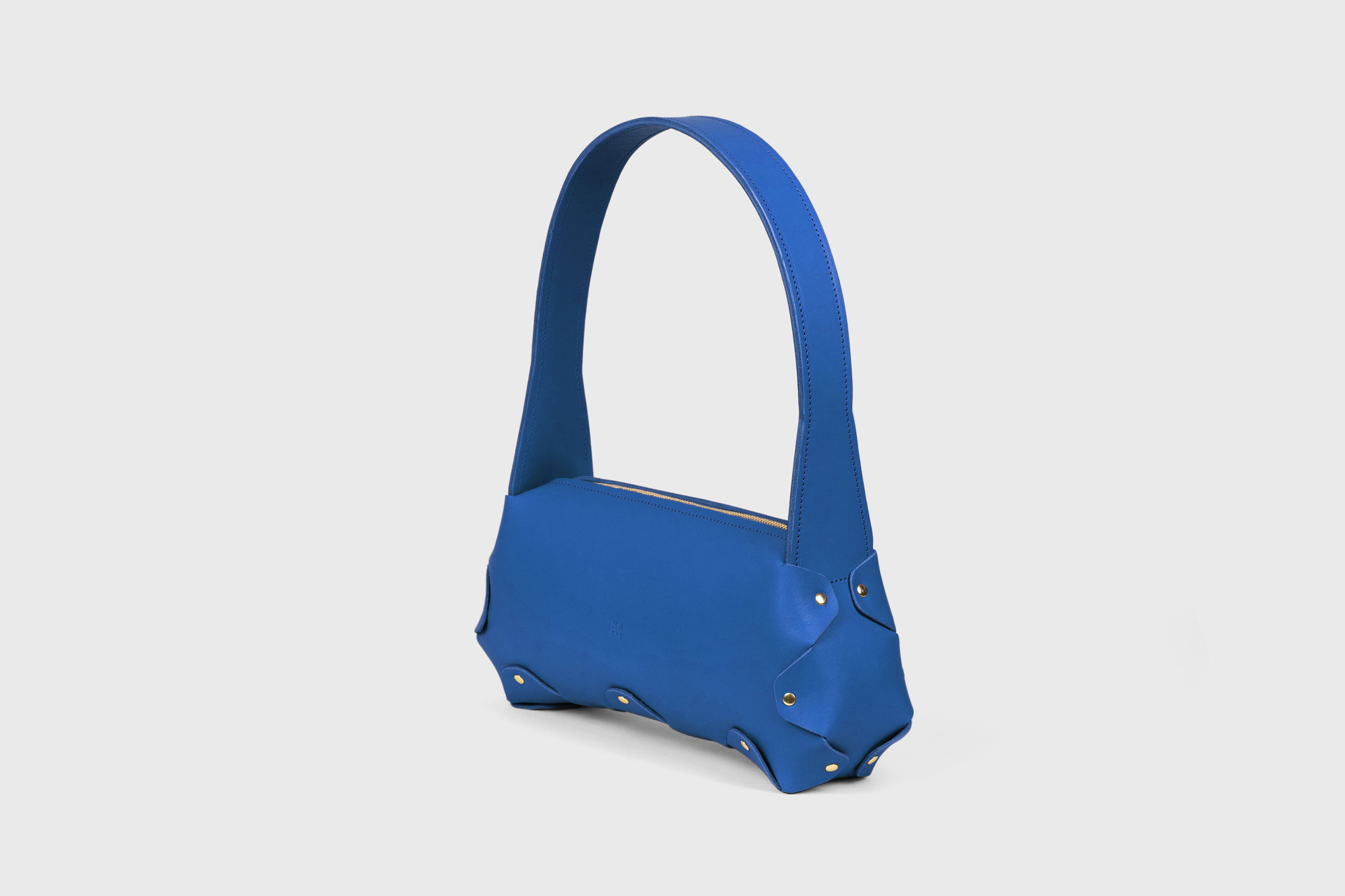 Fiona Bag In Royal Blue Color In Full Grain Vegetable Tanned Leather Minimalistic Design Shoulder Bag Atelier Madre Manuel Dreesmann Barcelona Spain