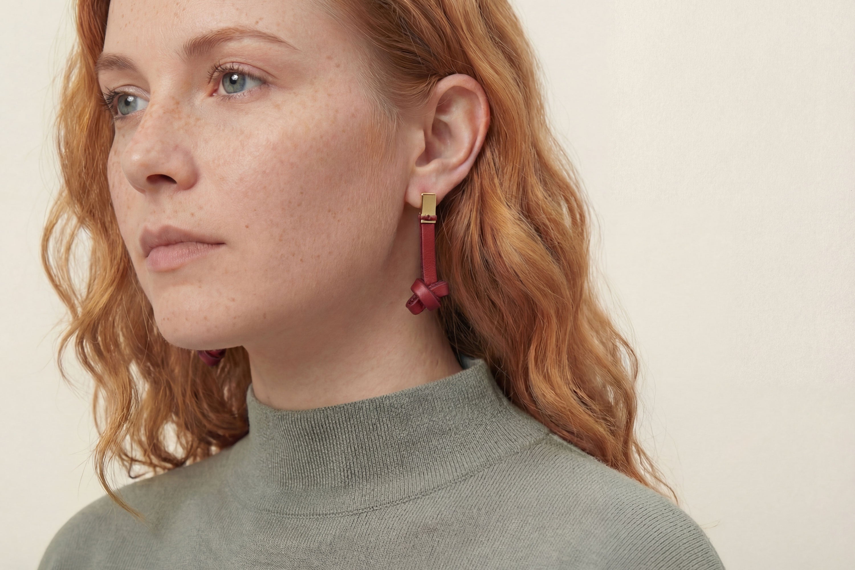 Gaia Earrings In Red Color In Vegetable Tanned Leather Minimalistic Design Atelier Madre Manuel Dreesmann Barcelona Spain