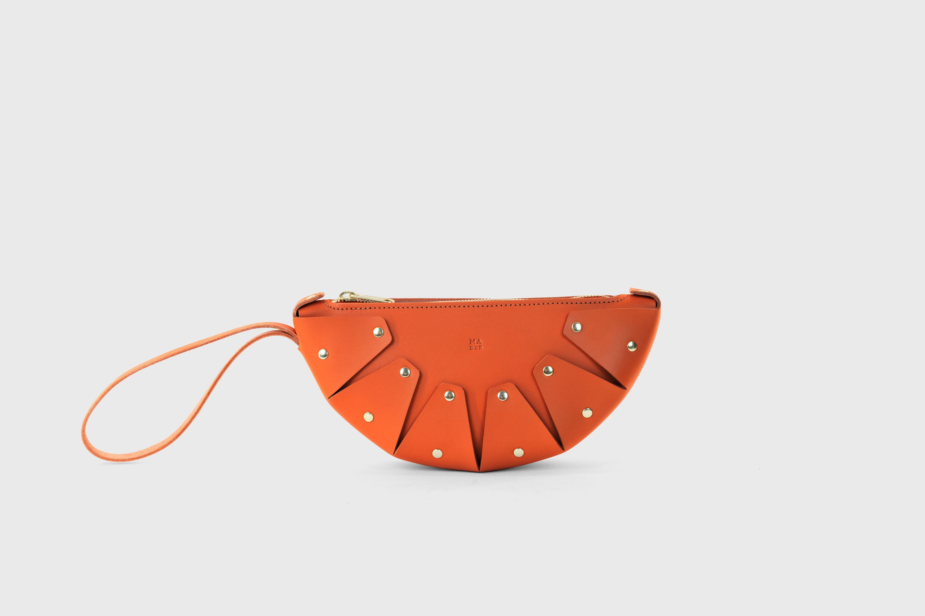 Juno Leather Bag Orange Color Vegetable Tanned Full Grain Spain Brass Rivets Design Minimalist Half Moon Circle Round Zipper Pouch Handbag Clutch Bag Atelier Madre Manuel Dreesmann Barcelona