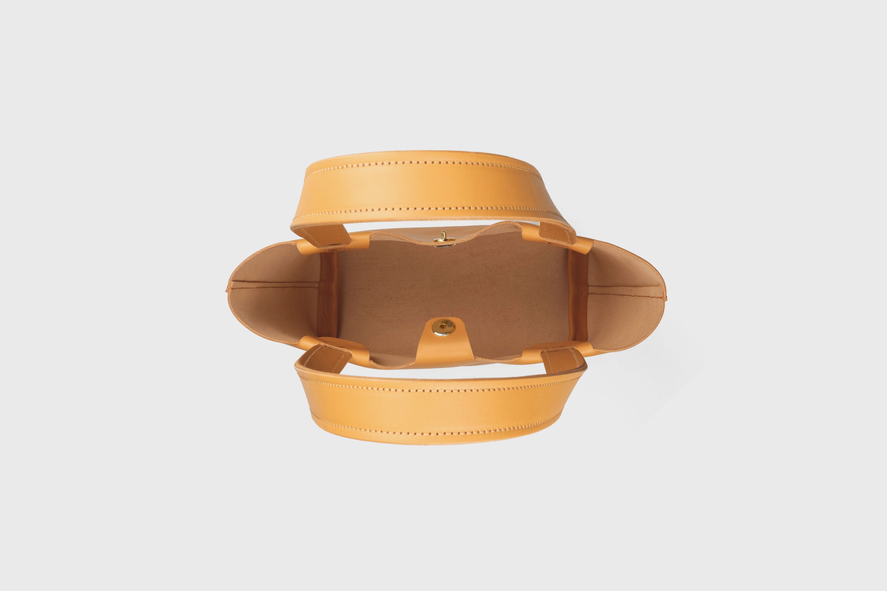 Karin Bag Closure In Brown Color In Vegetable Tanned Leather Magnetic Closure Open Top Minimalistic Design Barcelona Spain