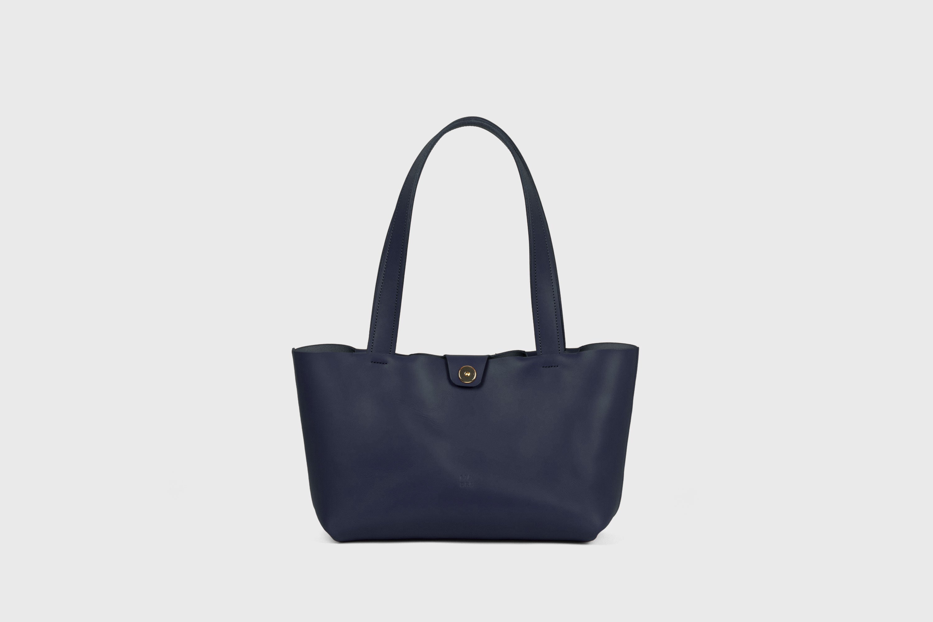 Karin Bag Closure In Marine Blue Color In Vegetable Tanned Leather Magnetic Closure Open Top Minimalistic Design Barcelona Spain
