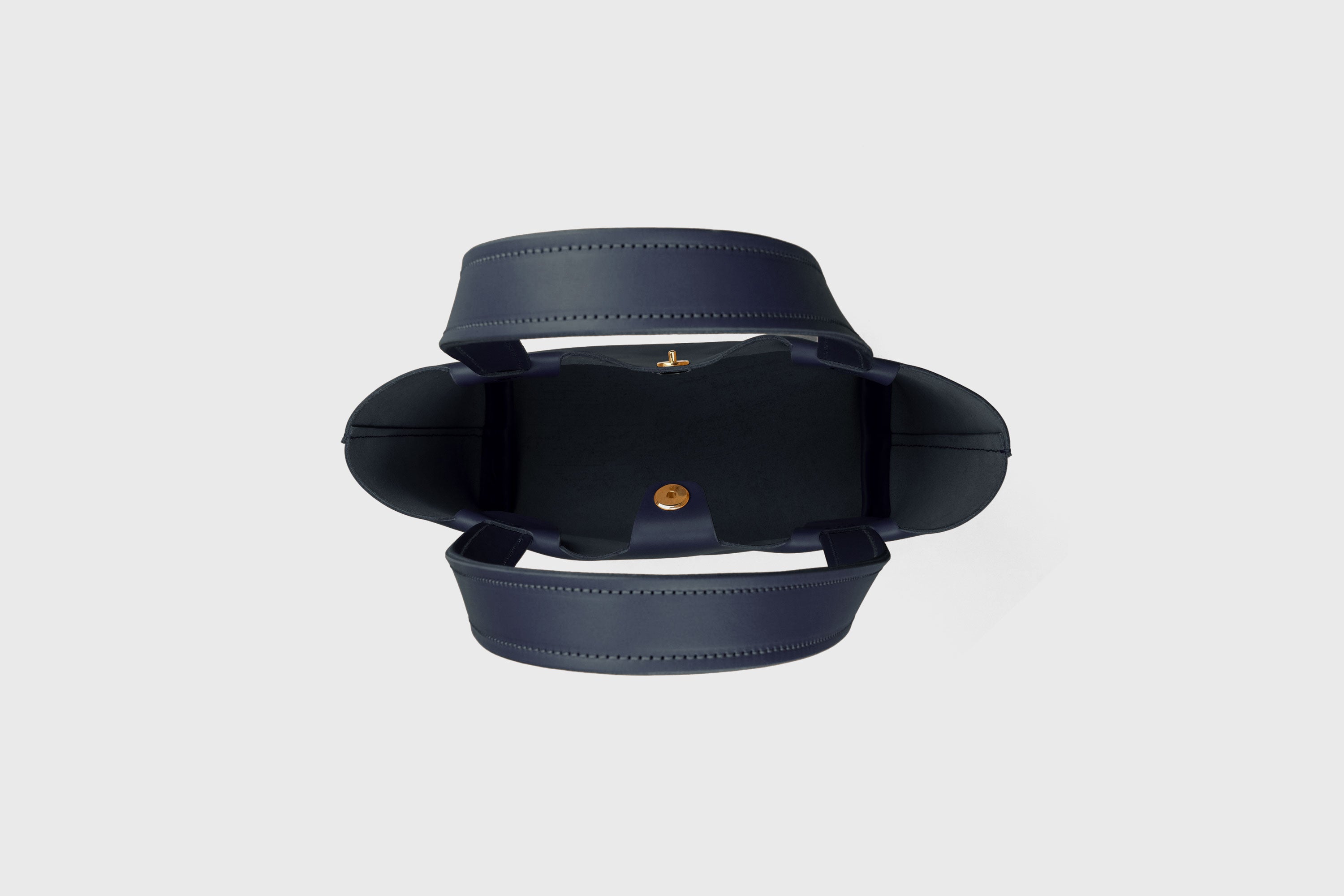 Karin Bag Closure In Marine Blue Color In Vegetable Tanned Leather Magnetic Closure Open Top Minimalistic Design Barcelona Spain