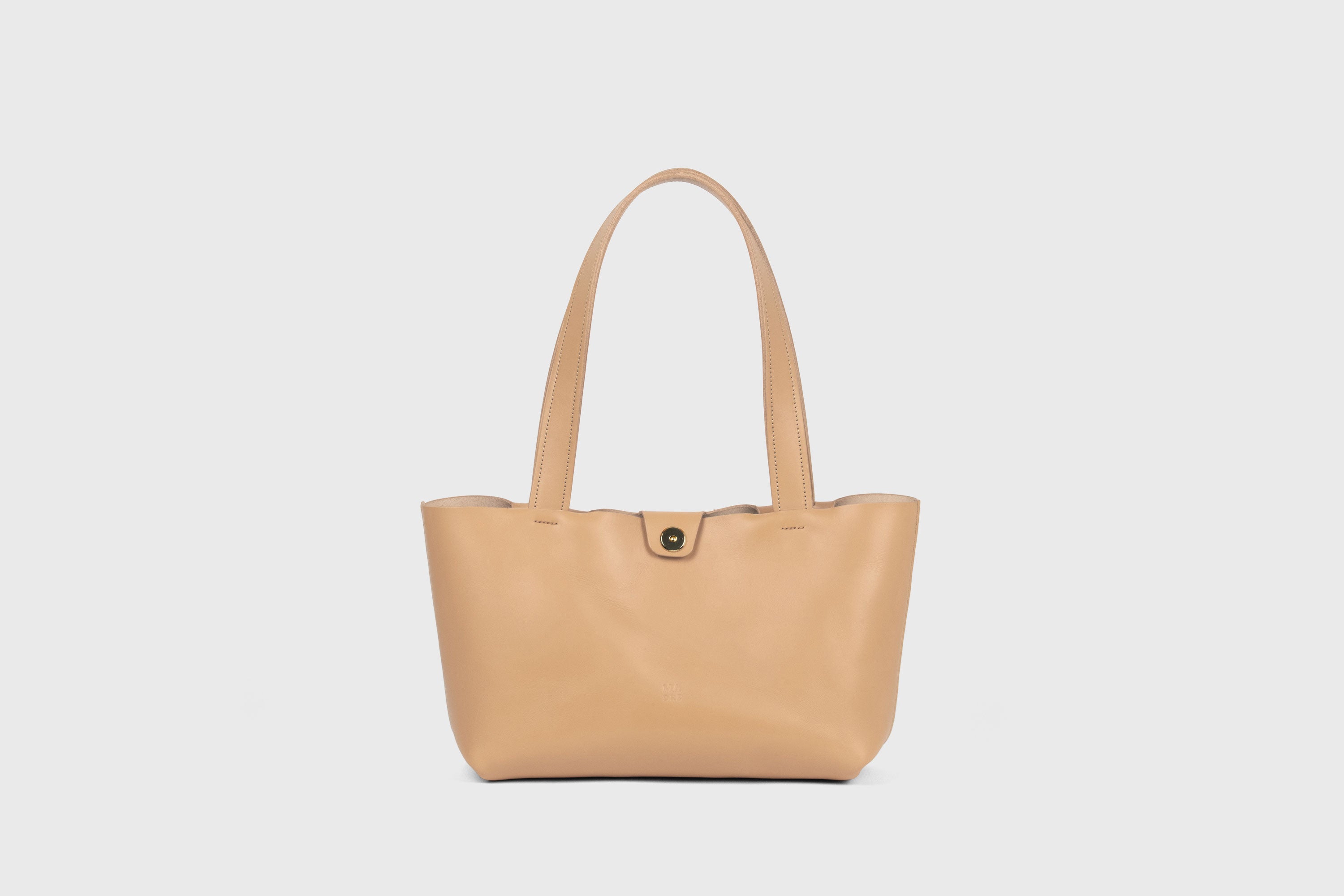 Karin Bag Closure In Natural Color In Vegetable Tanned Leather Magnetic Closure Open Top Minimalistic Design Barcelona Spain