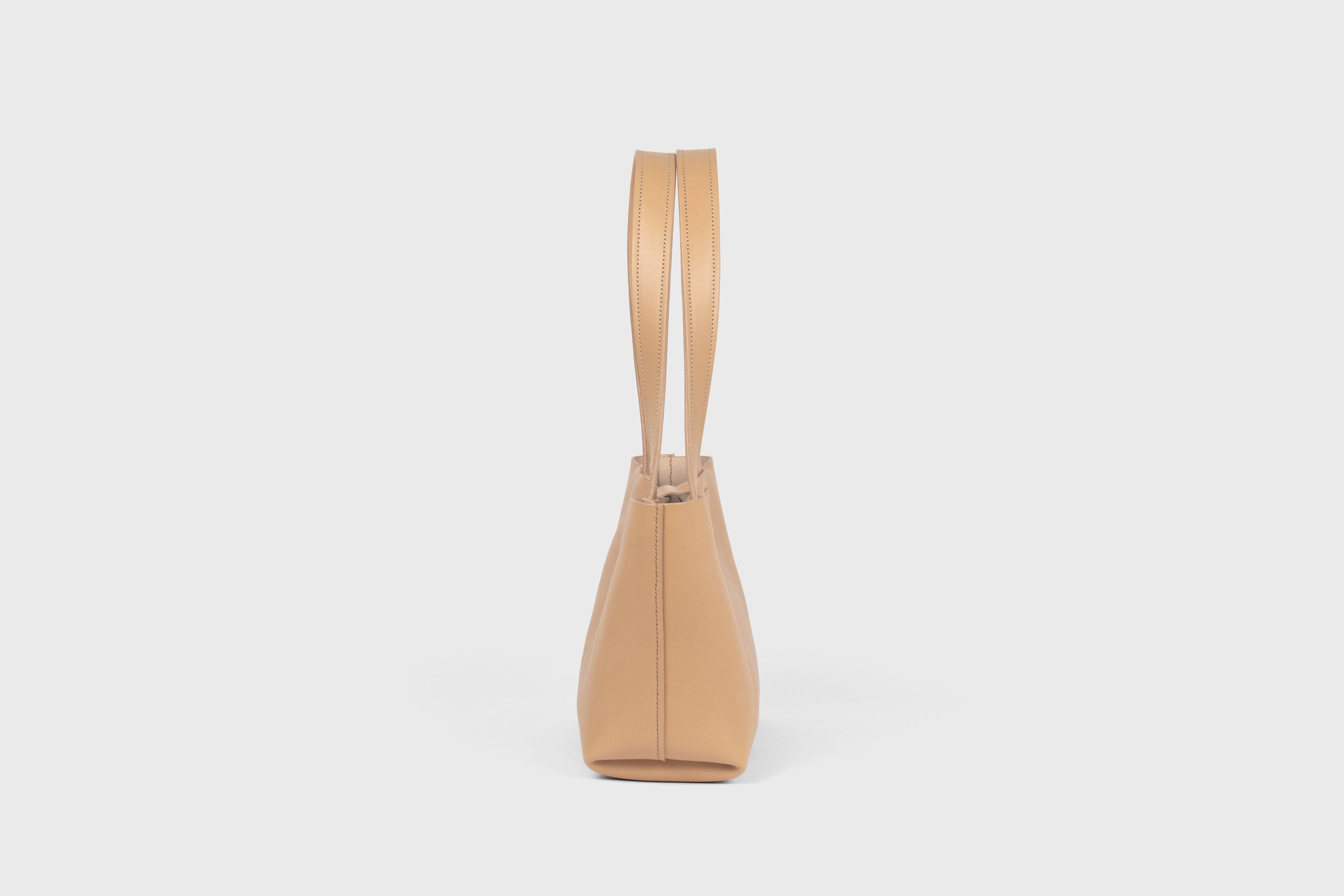 Karin Bag Closure In Natural Color In Vegetable Tanned Leather Magnetic Closure Open Top Minimalistic Design Barcelona Spain