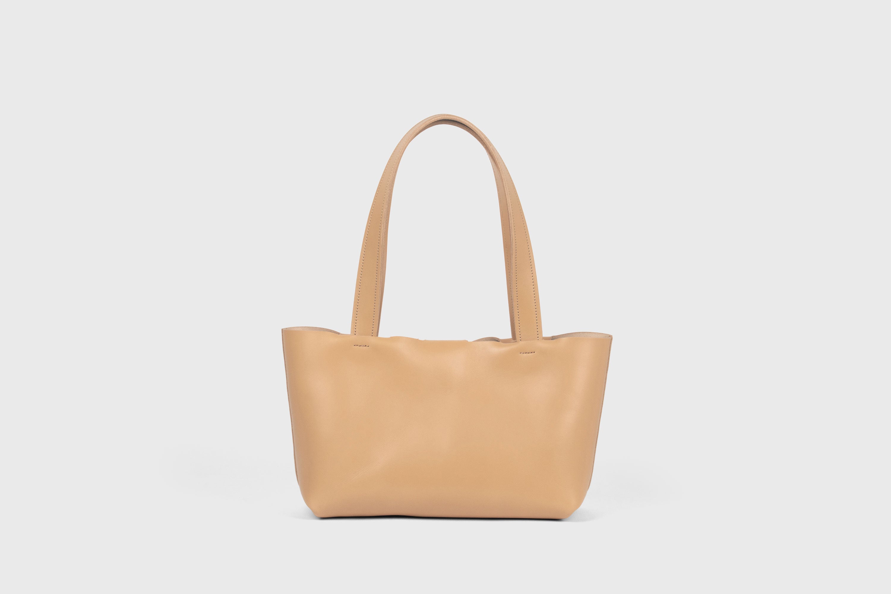 Karin Bag Closure In Natural Color In Vegetable Tanned Leather Magnetic Closure Open Top Minimalistic Design Barcelona Spain